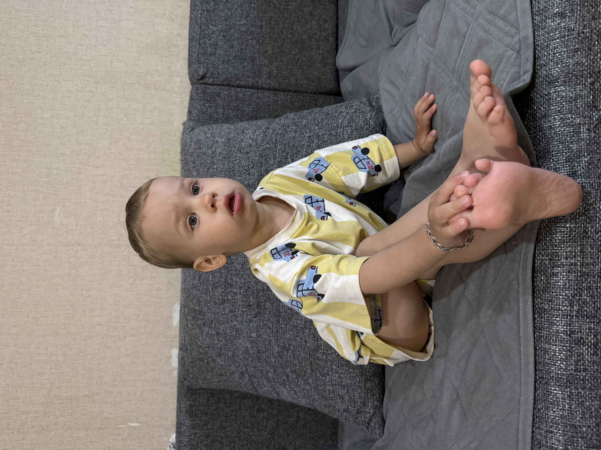 Baby photographed on sofa in Russian village