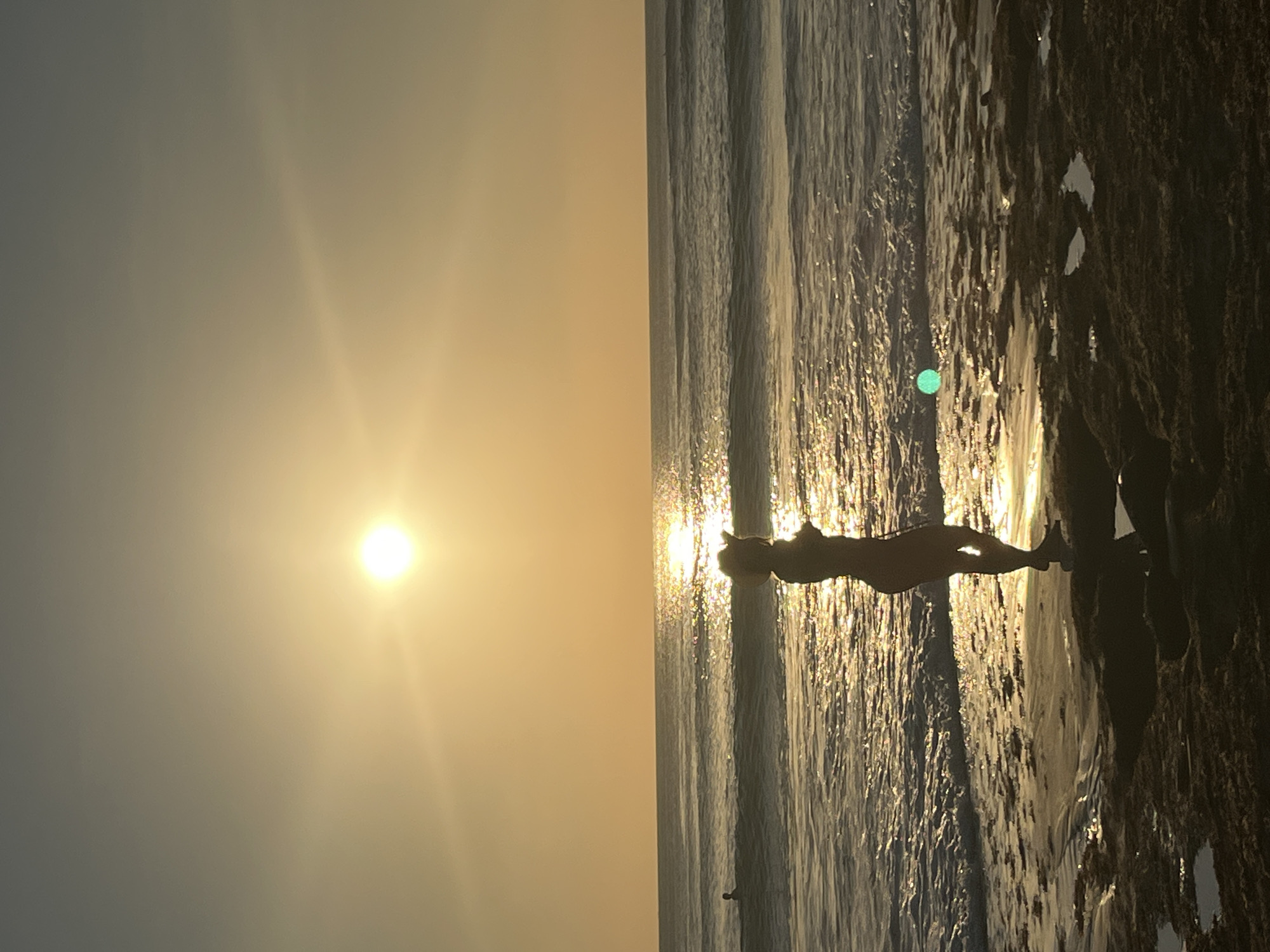 Sunset beach activities and volleyball games on Kuta Beach