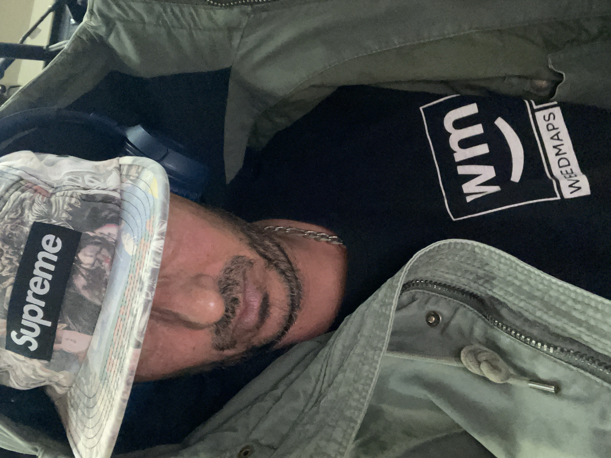Person observed resting in Barcelona wearing casual clothing