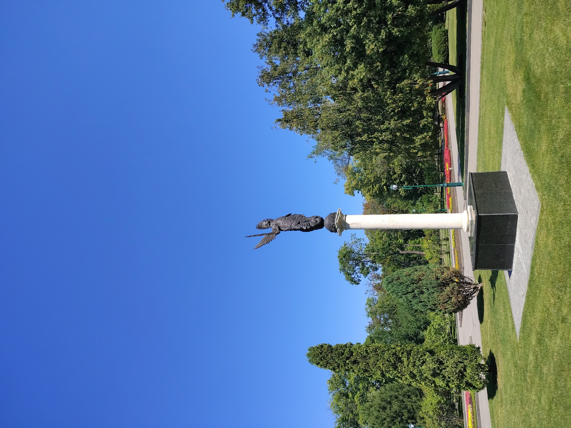 Summer morning in a Kharkiv park: sculptures, flowers, and details