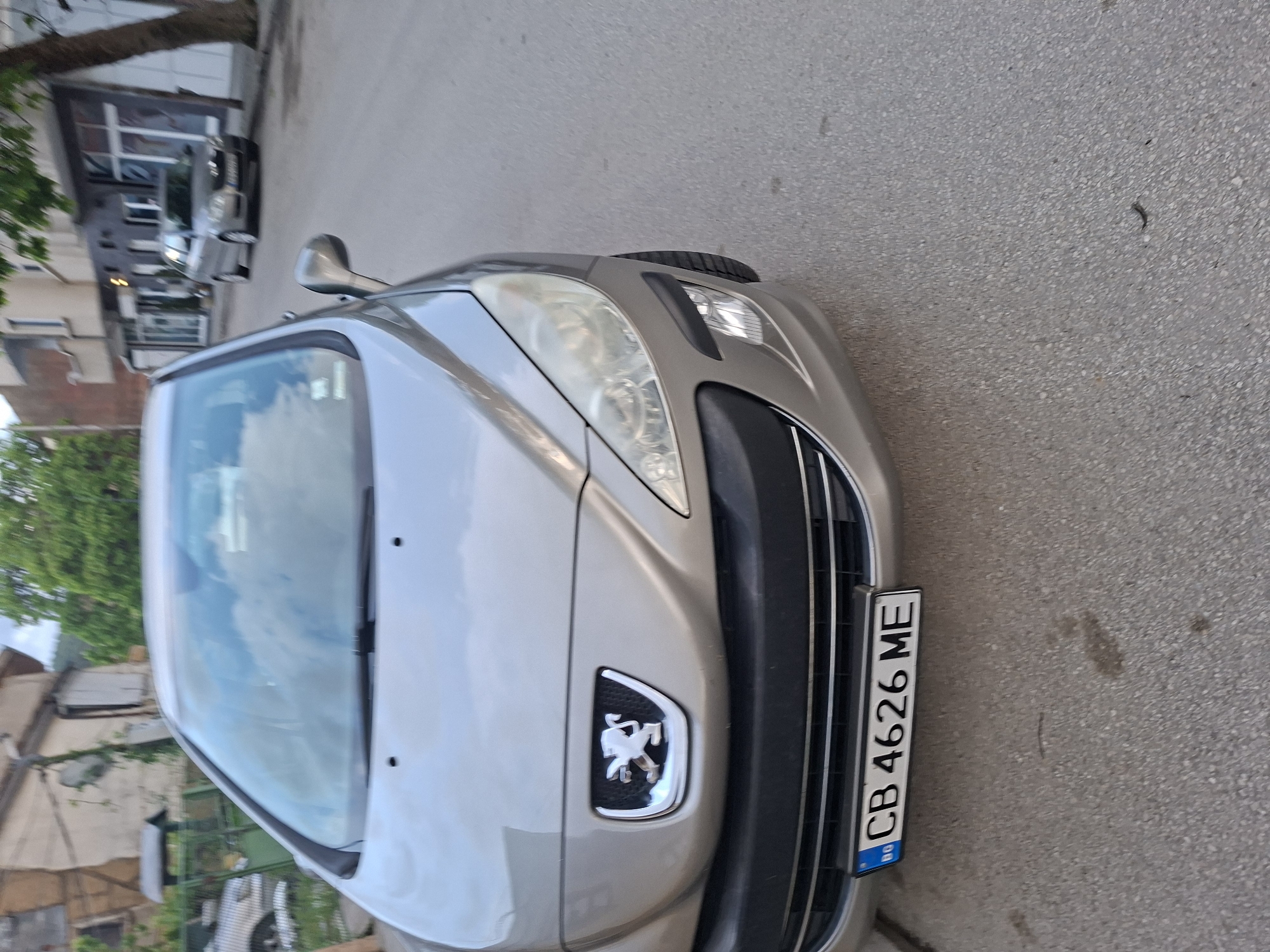 Parked car and bicycle shop observed in Gabrovo, Bulgaria