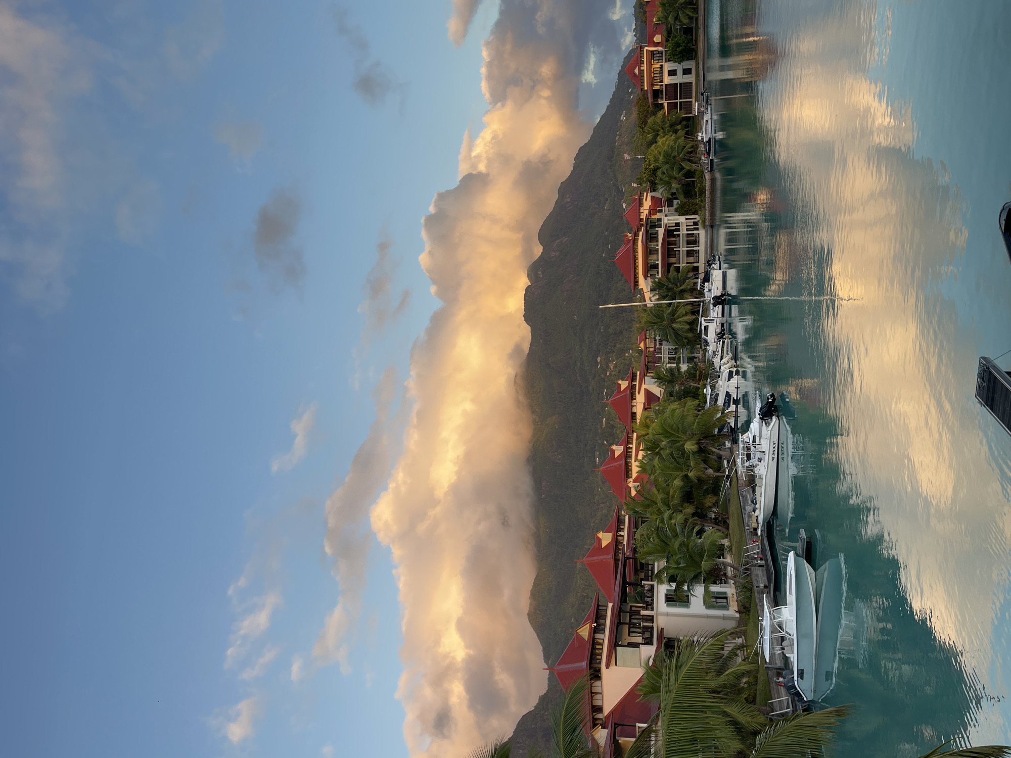 Tranquil canal and docked boats in Providence, Seychelles