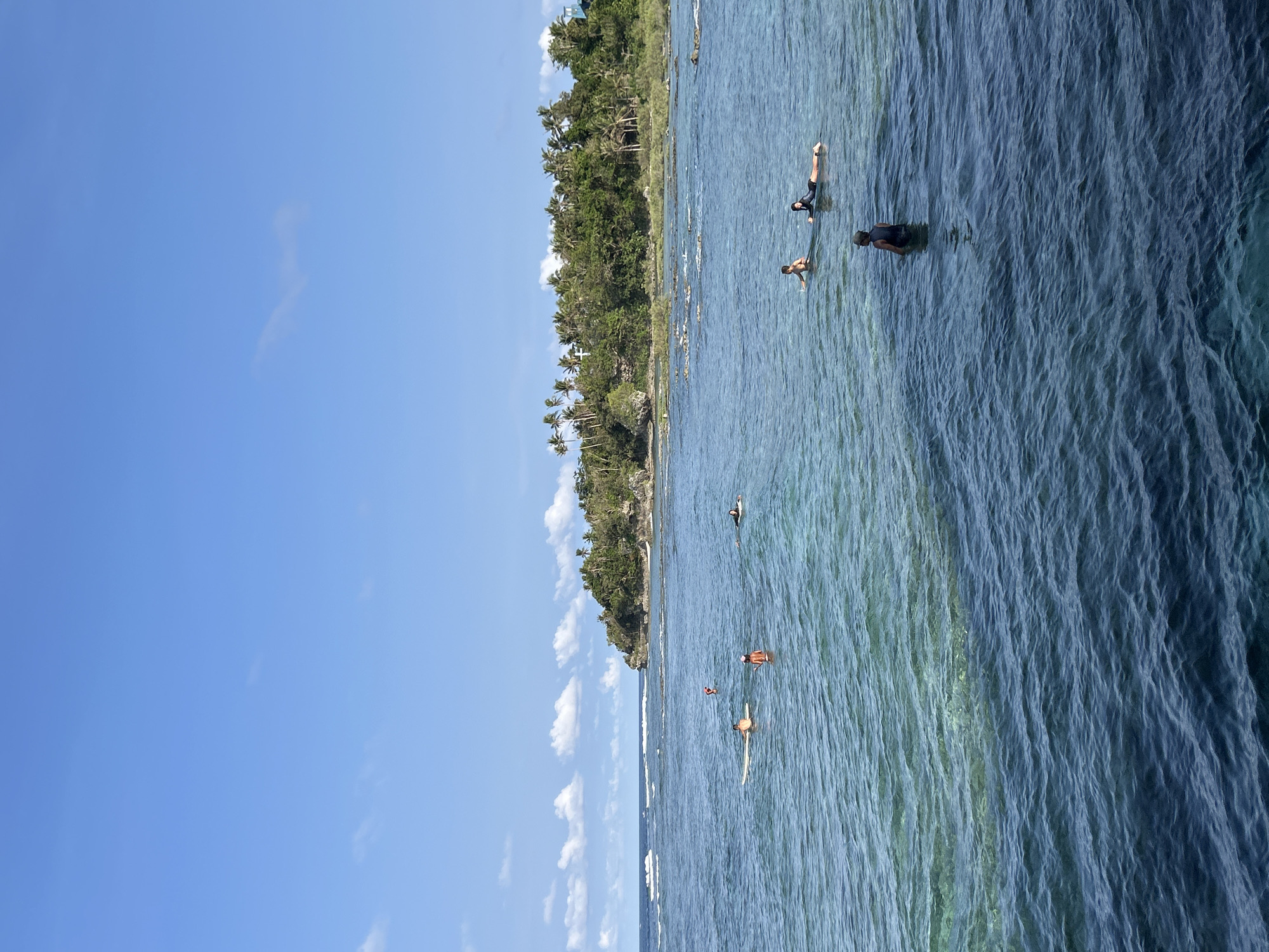Morning beach activities captured at General Luna coastal waters