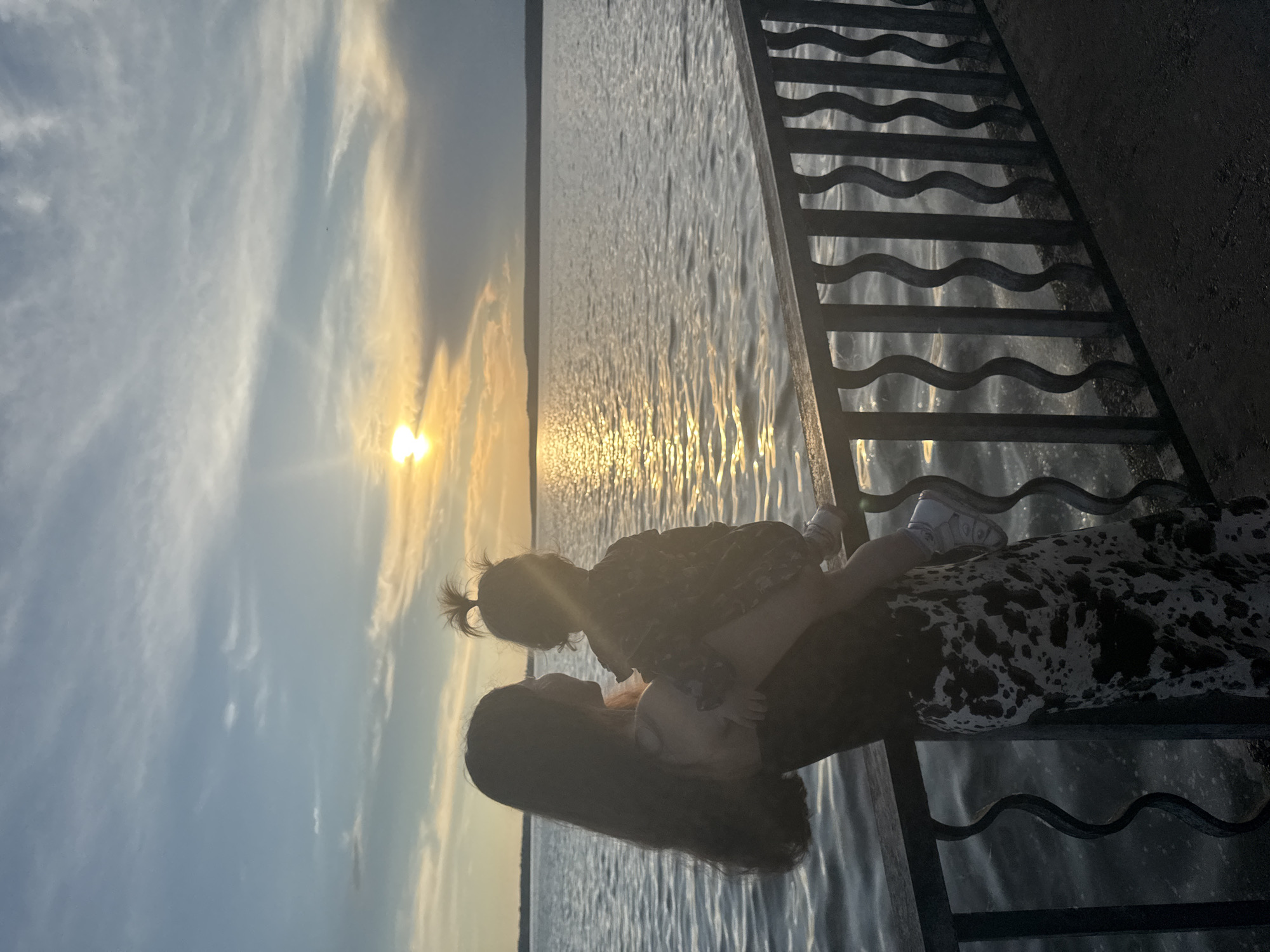 Family enjoys golden hour at Votkinsk waterfront promenade