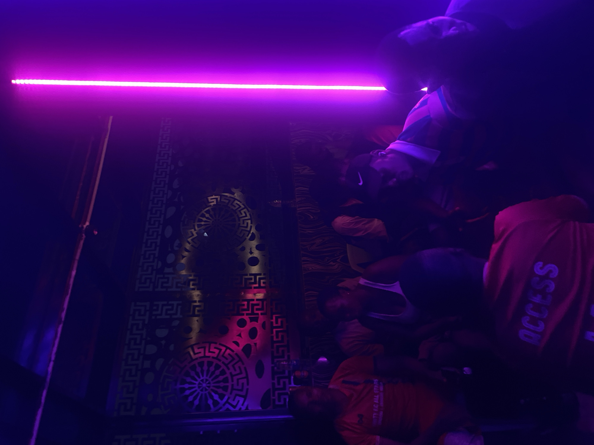 Night out at a neon-lit club in Kurunduma, Nigeria