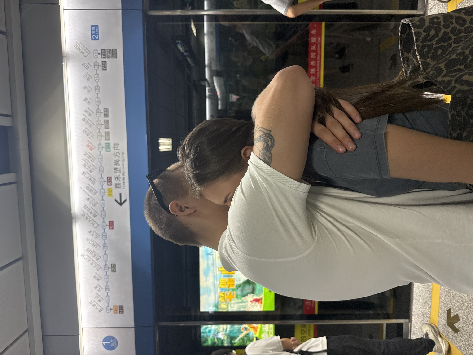 Goodbye moment on a Guangzhou subway platform