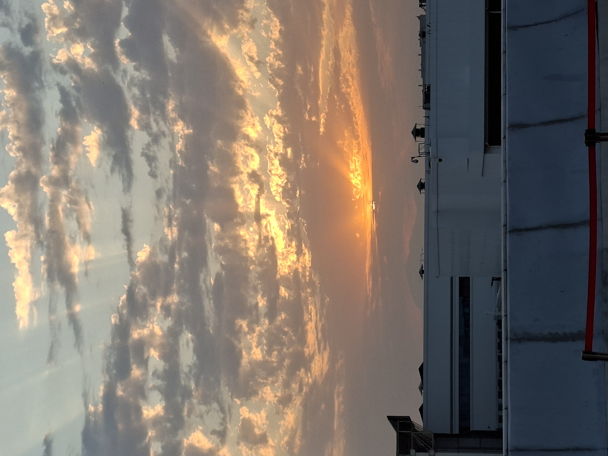 Tashkent sunset across industrial and airport scenes