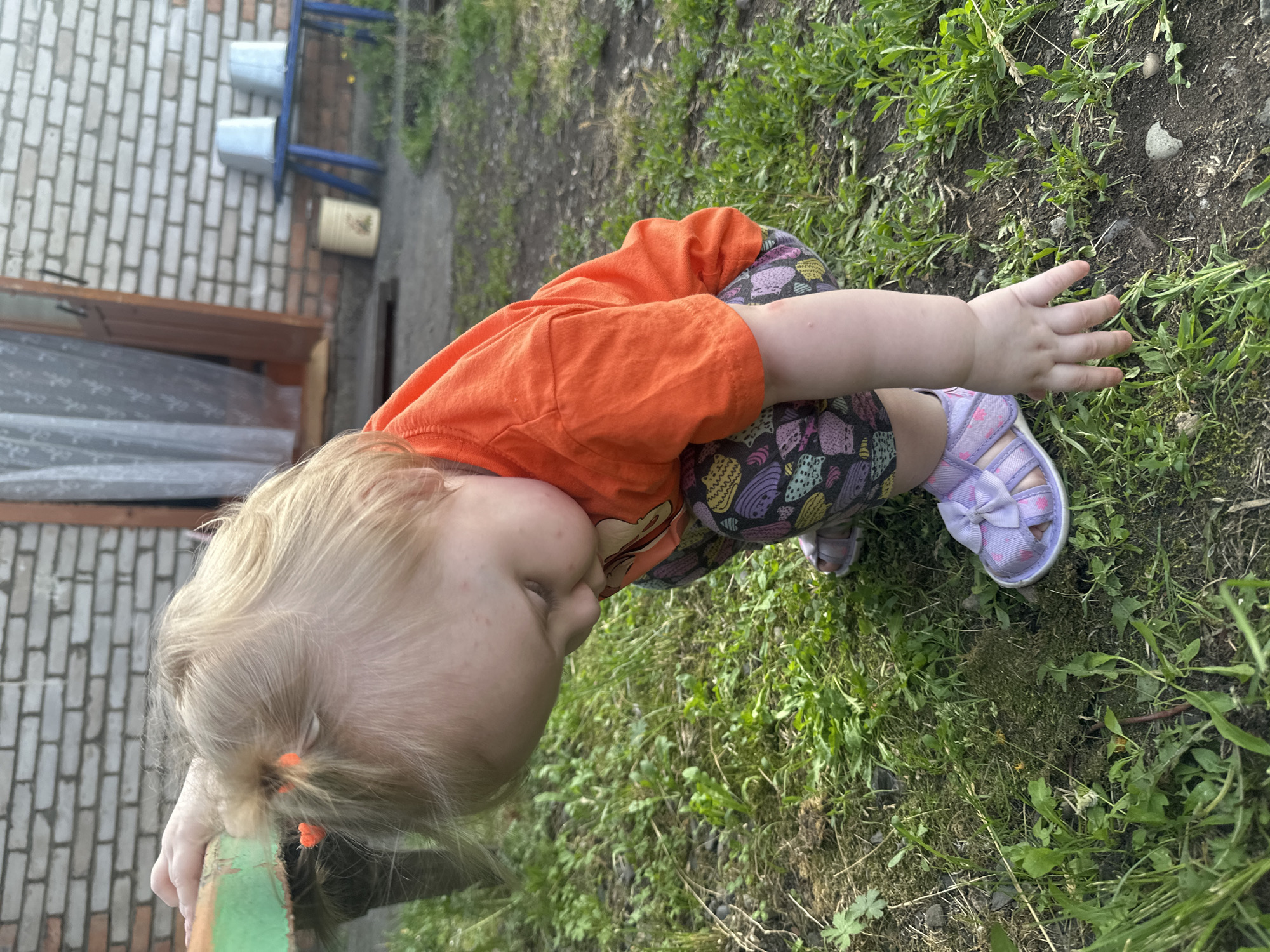 Rural afternoon play session in Novoyeniseyka village yard
