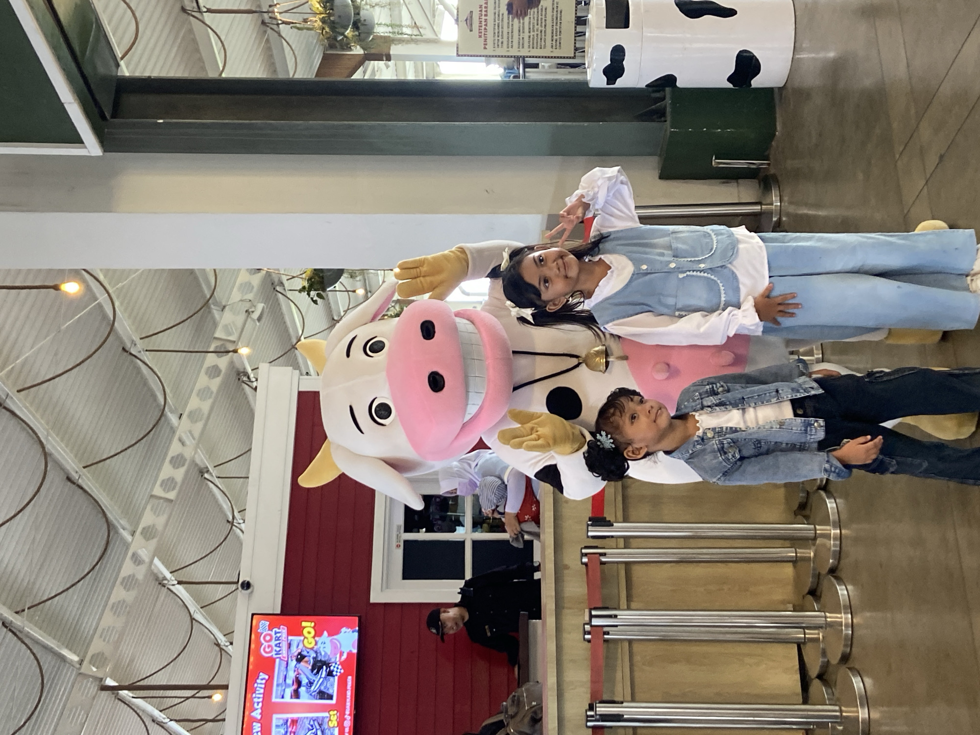 Visitors document dairy-themed tourist attraction in Prigen, Indonesia