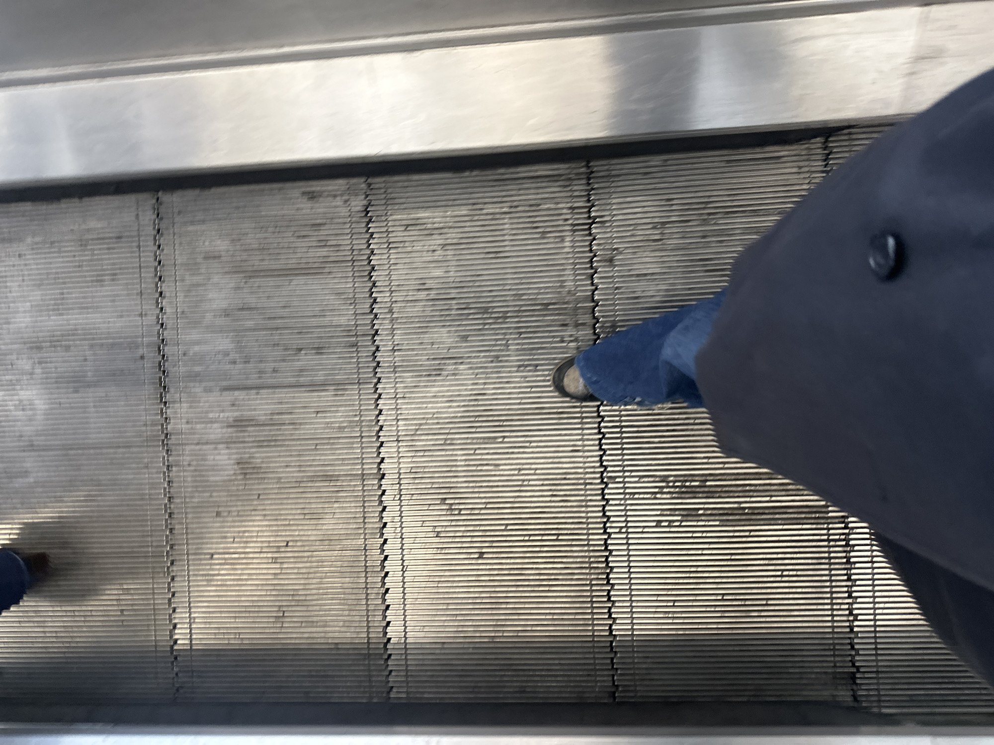 Person spotted on London Underground escalator during morning hours