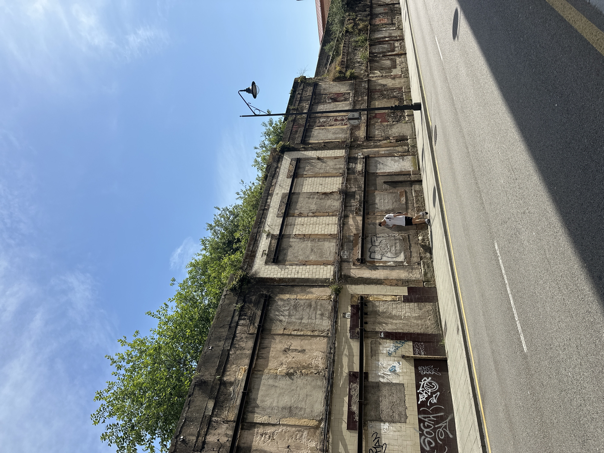 Tourist captures street life during morning walk through Gijón