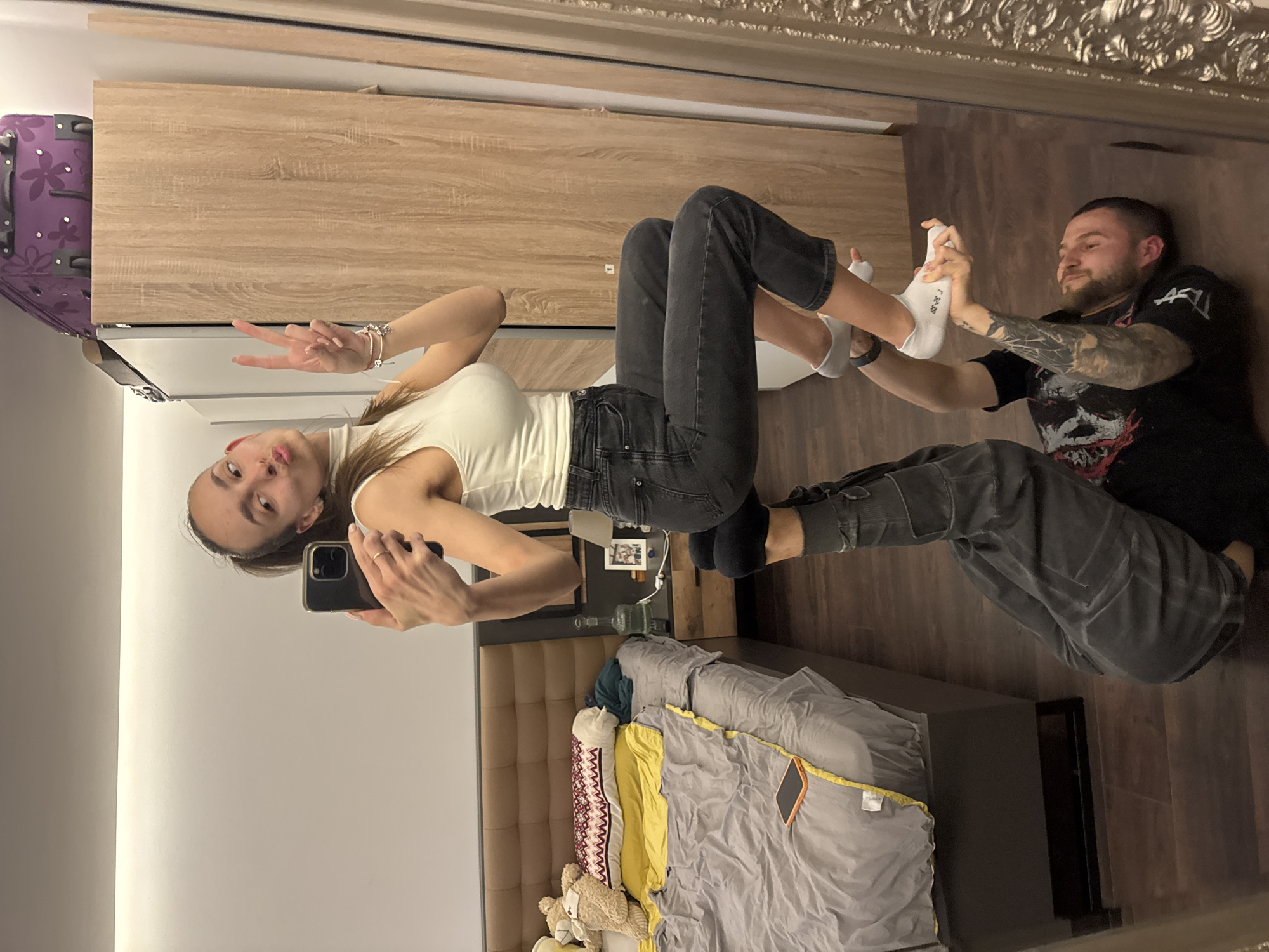 Couple shares intimate bedroom moments in Sofia apartment