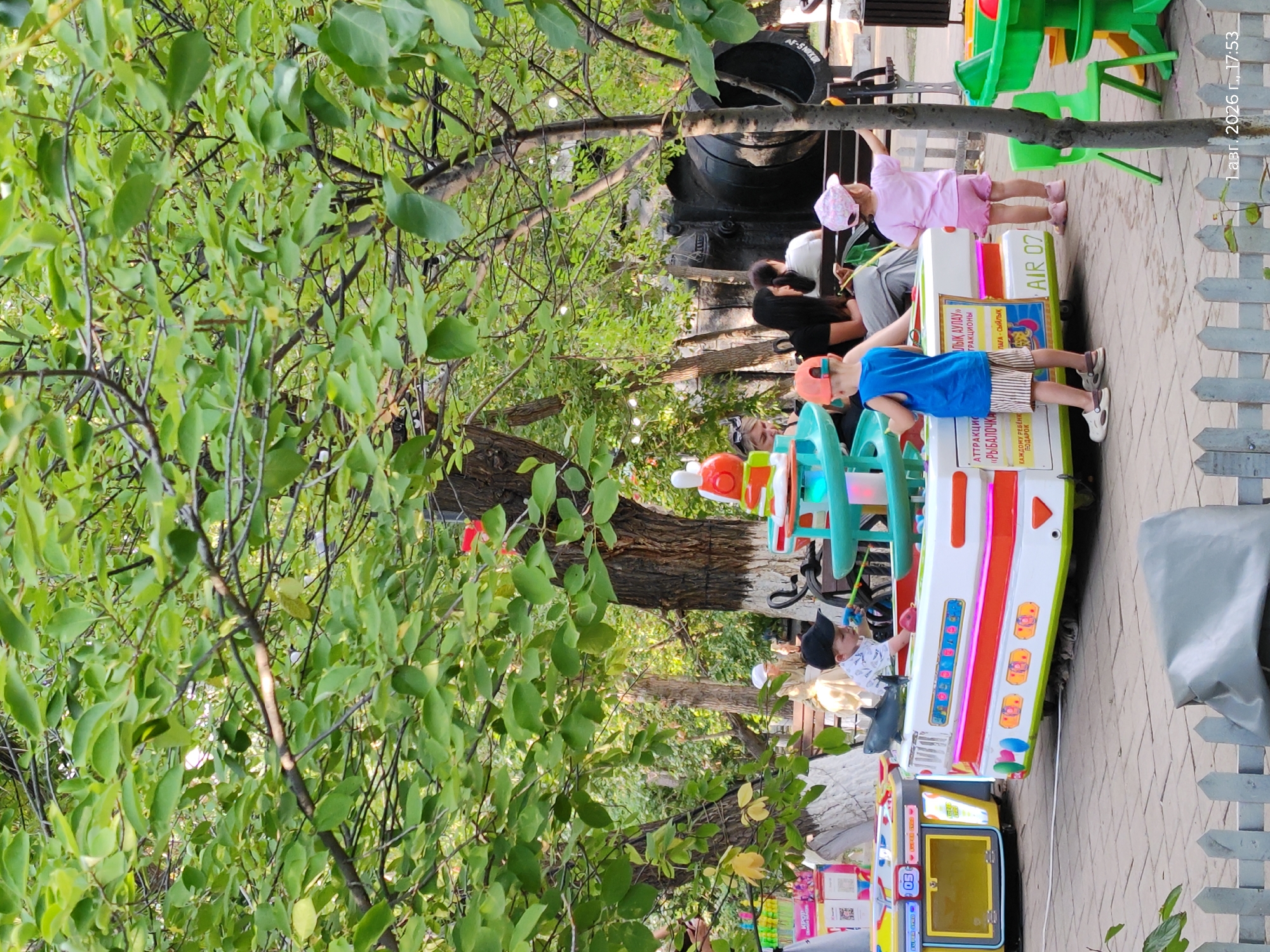 Amusement park rides and street art in Astana