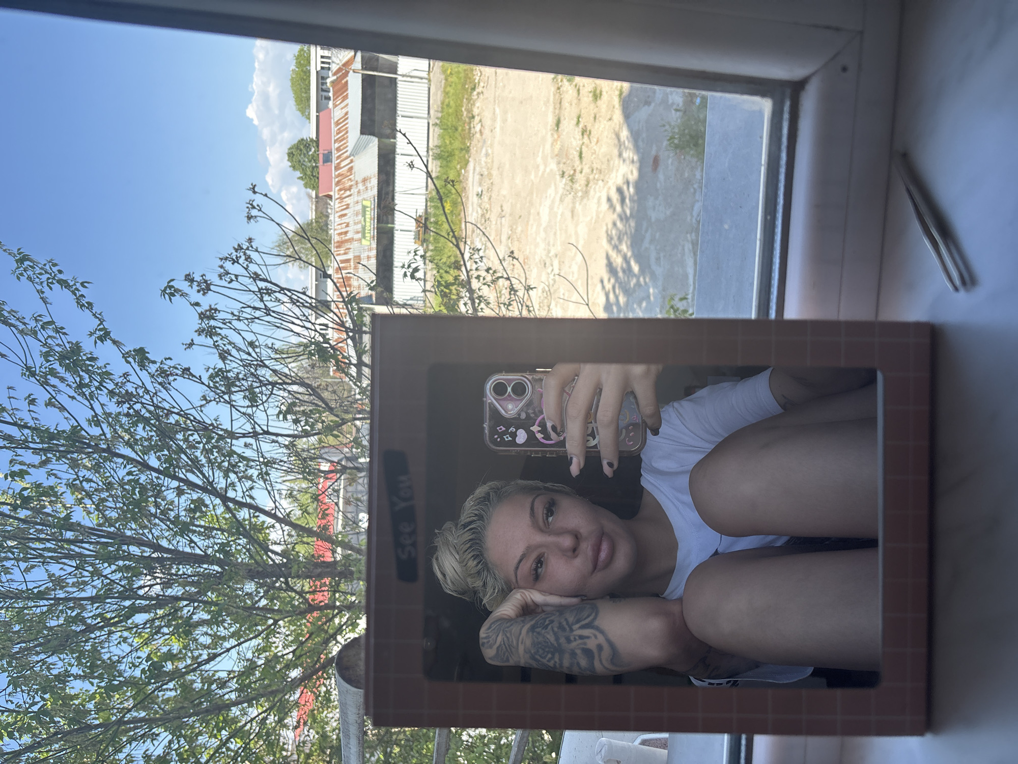 Woman takes mirror selfies in Plovdiv, Bulgaria