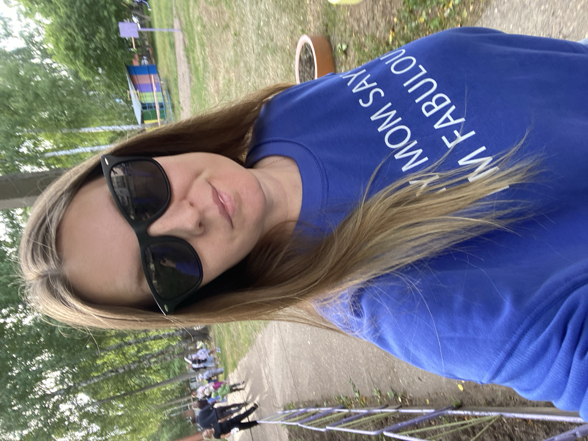 Woman in novelty sweatshirt photographed around Noviy, Russia