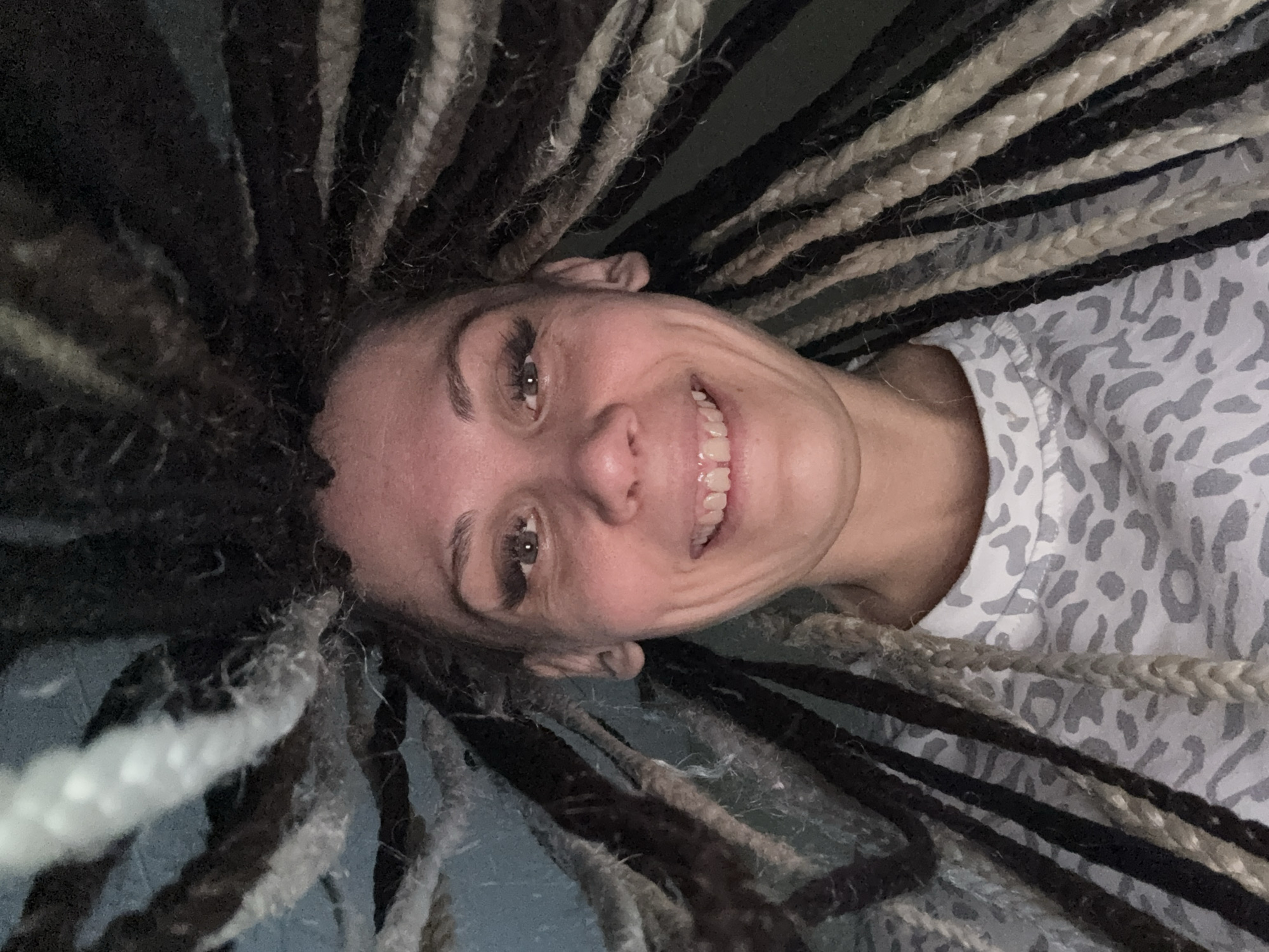 Person resting and smiling captured in Rusanovo, Russia