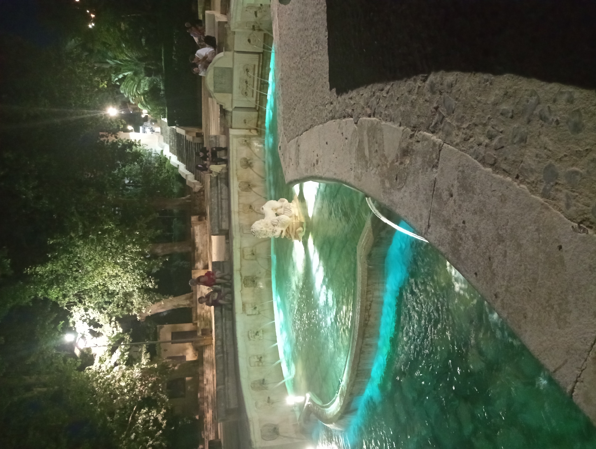 Priego de Córdoba's illuminated fountains glow at dusk