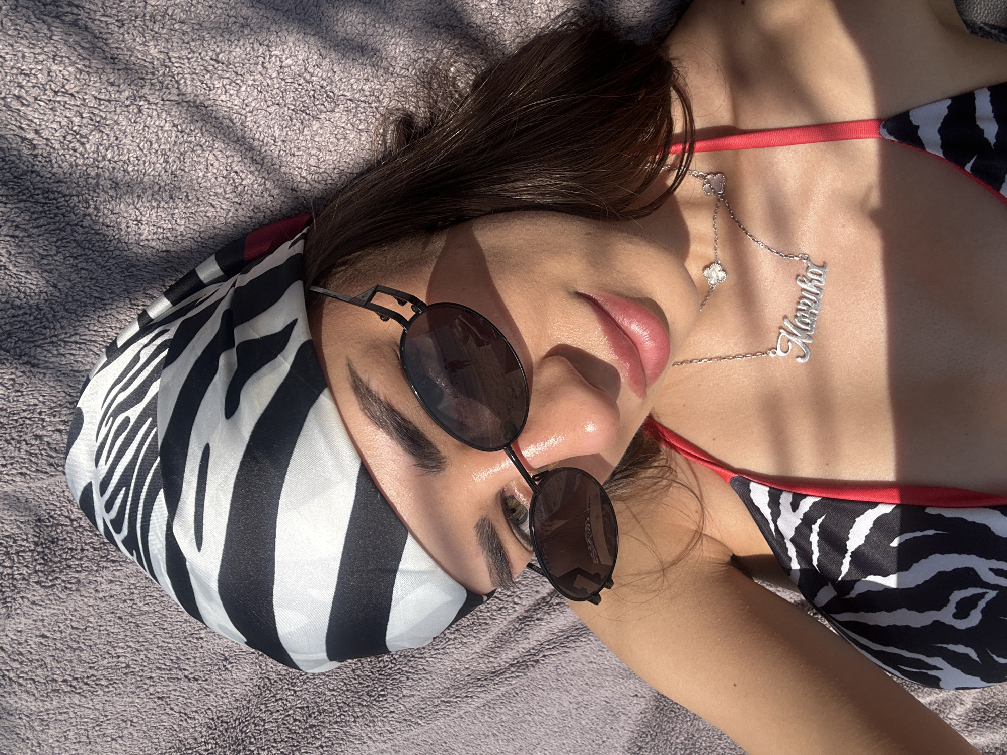 Slow beach day at Ofrynio — sun, shade, and cold juice