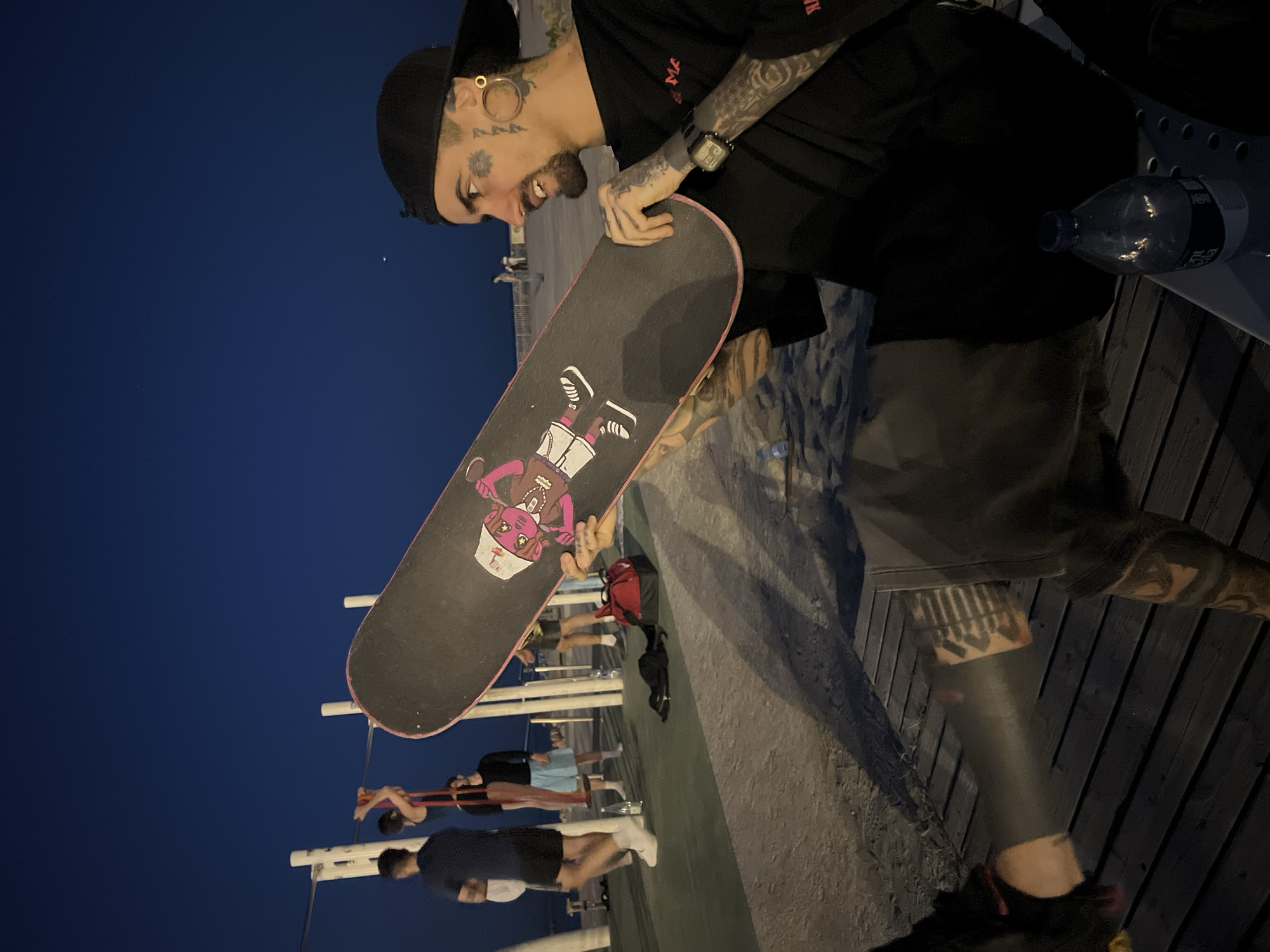 Evening workout session at Barcelona waterfront public gym