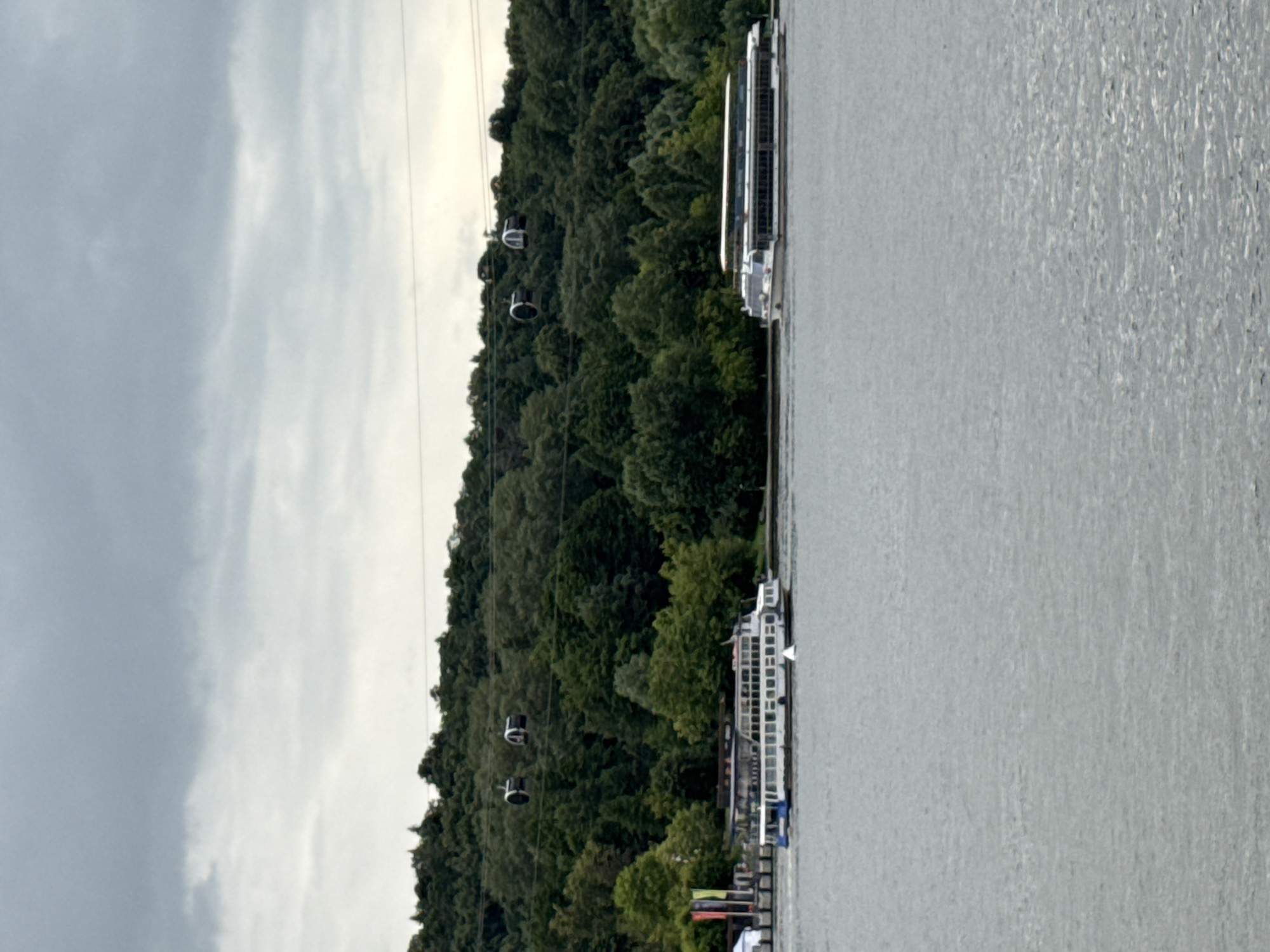Boats, cable cars, and joggers along Moscow's Sparrow Hills waterfront