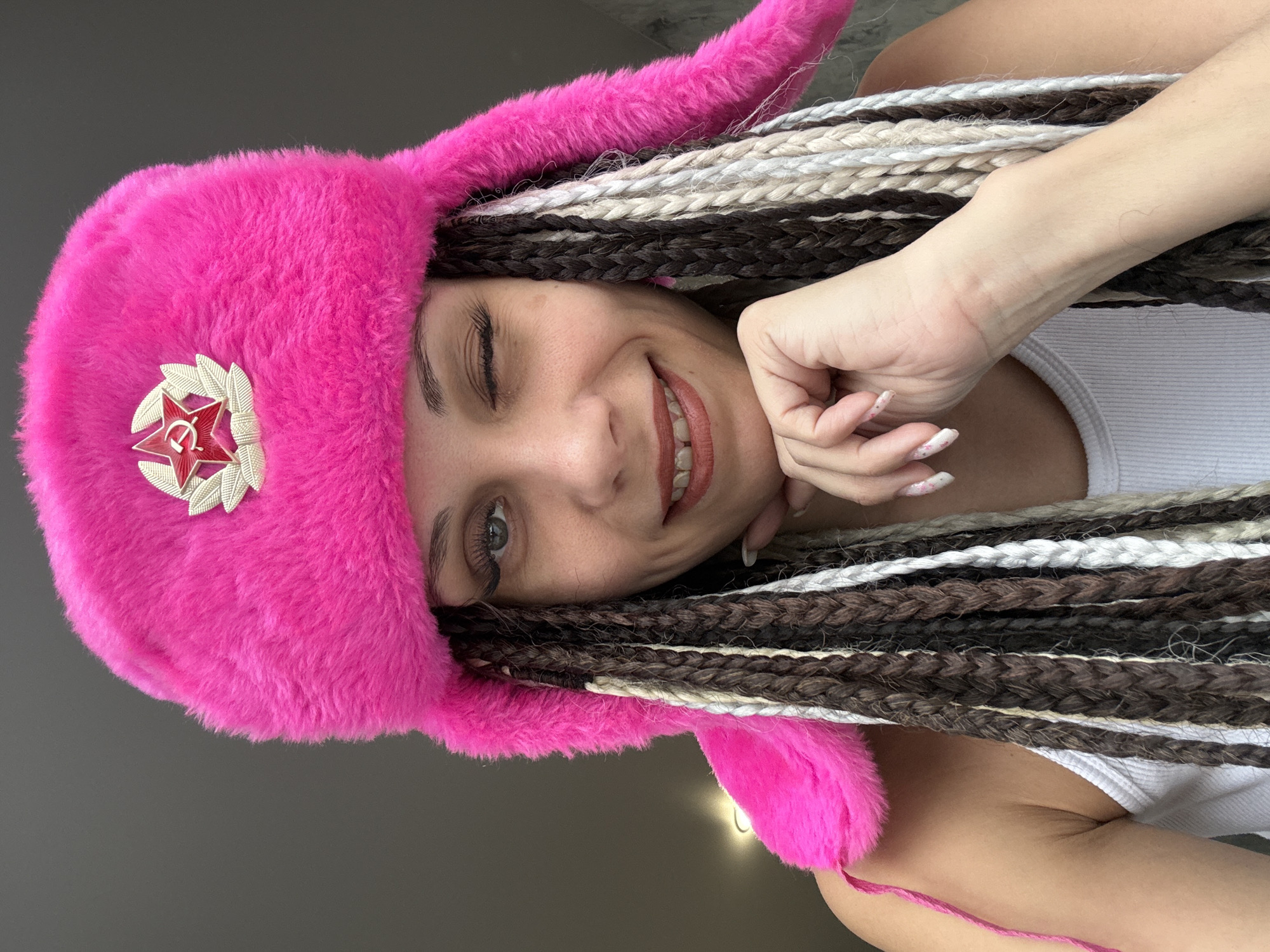 Person spotted wearing pink Soviet-star hat in Russia