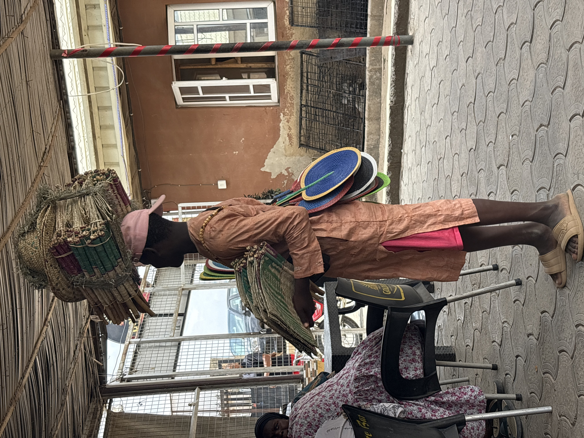 Street vendor operates in busy Abuja market area