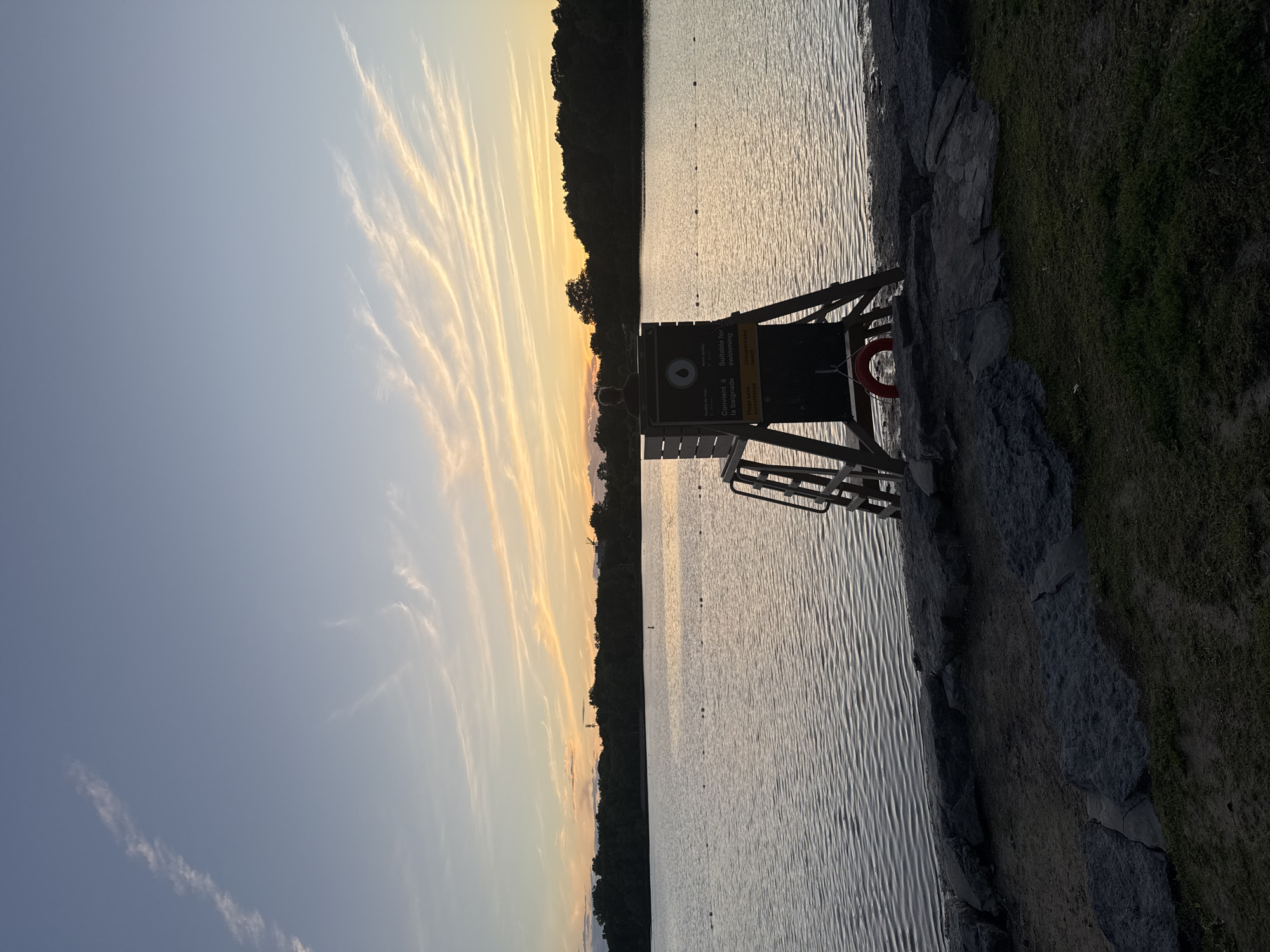 Lakeside barbecue and sunset in Gatineau on a summer evening