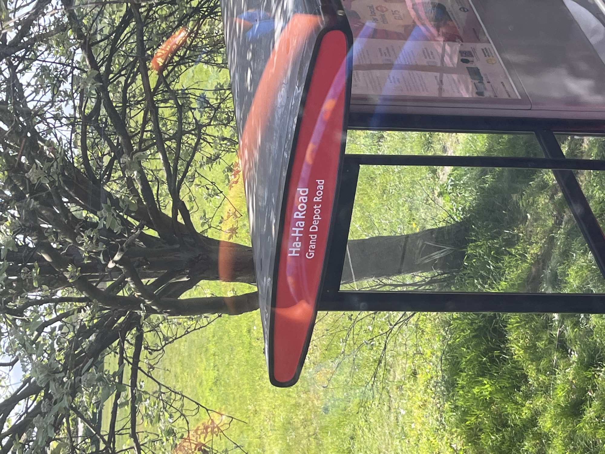 London bus stop documented at Ha-Ha Road intersection