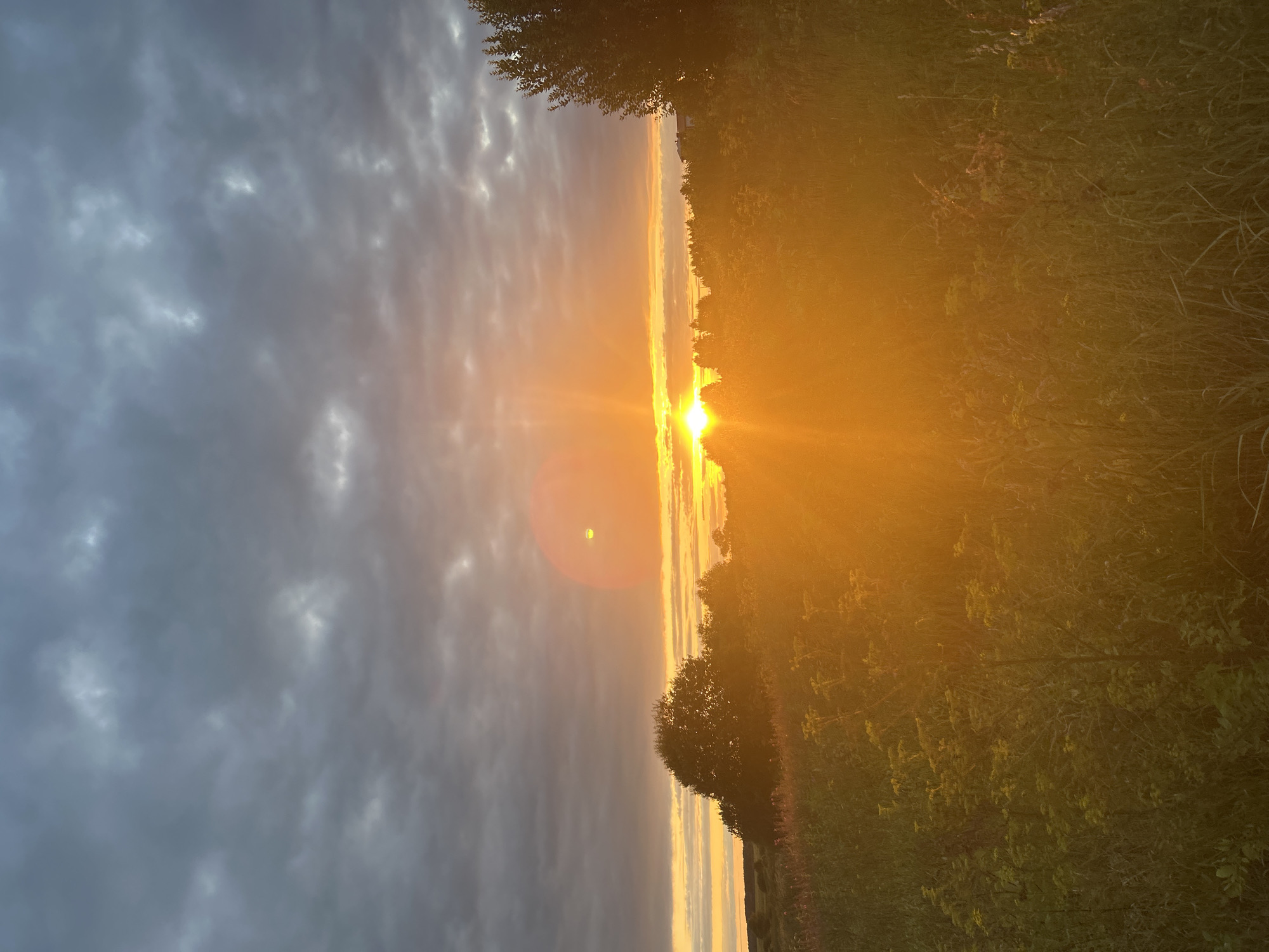 Sunset over rural fields in Kalitsino, Russia