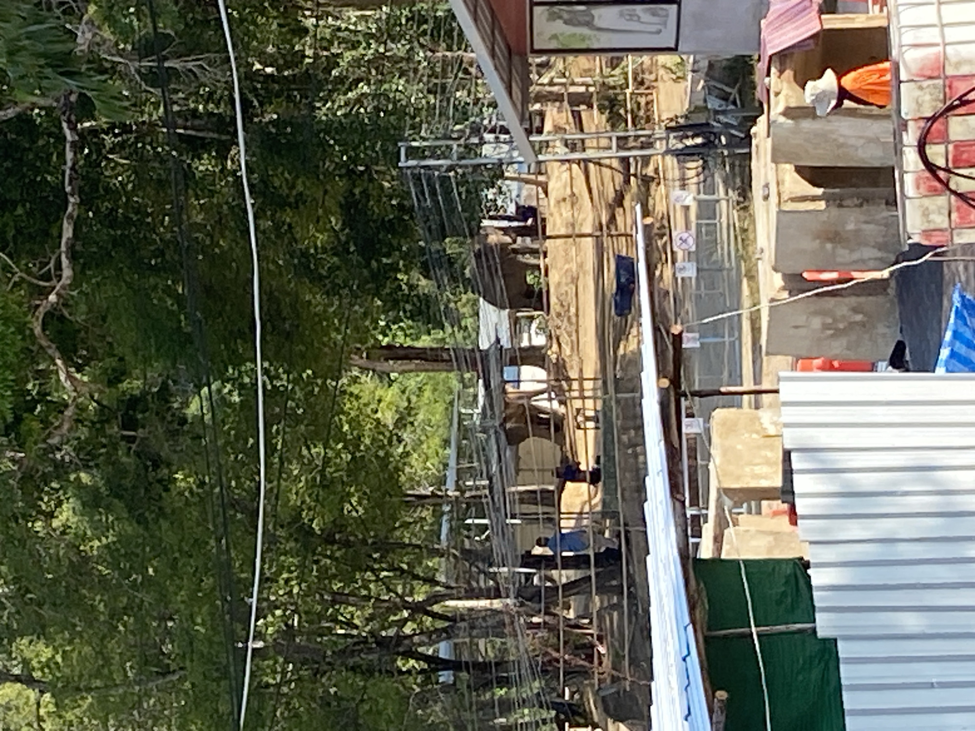 Construction activity continues in Choeng Thale, Thailand street scene