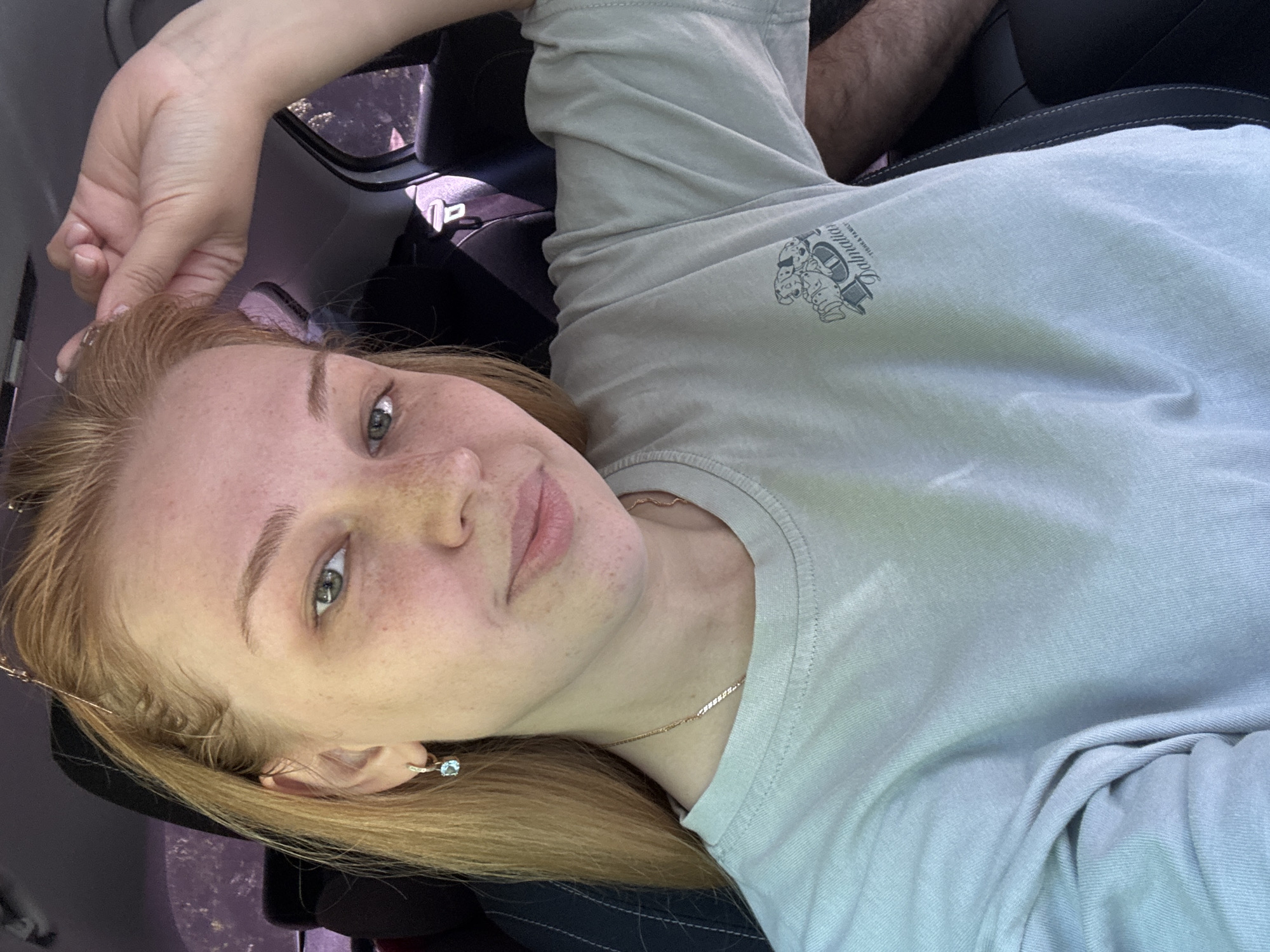 Woman photographed in car and outdoors in Yaroslavl