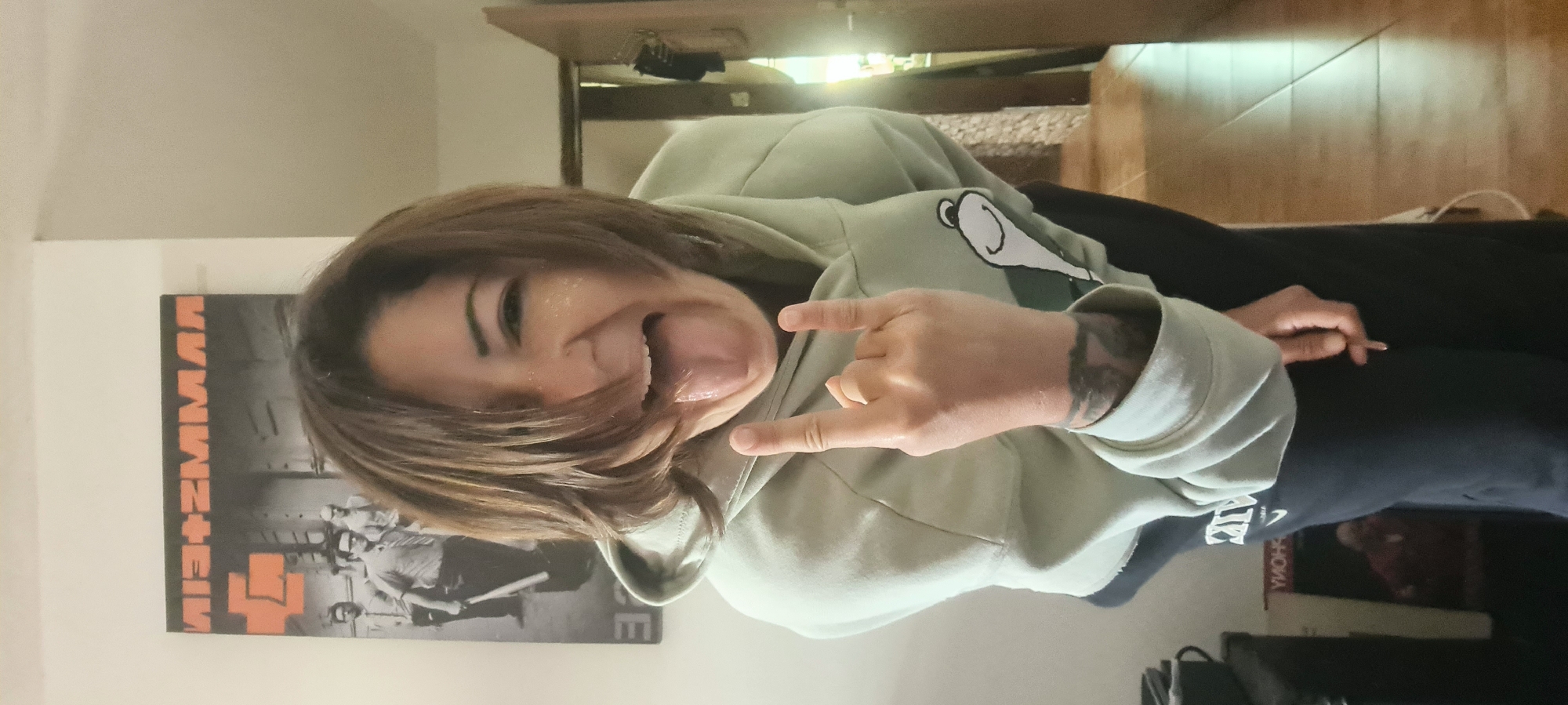 Person poses for photos in Israeli home early morning