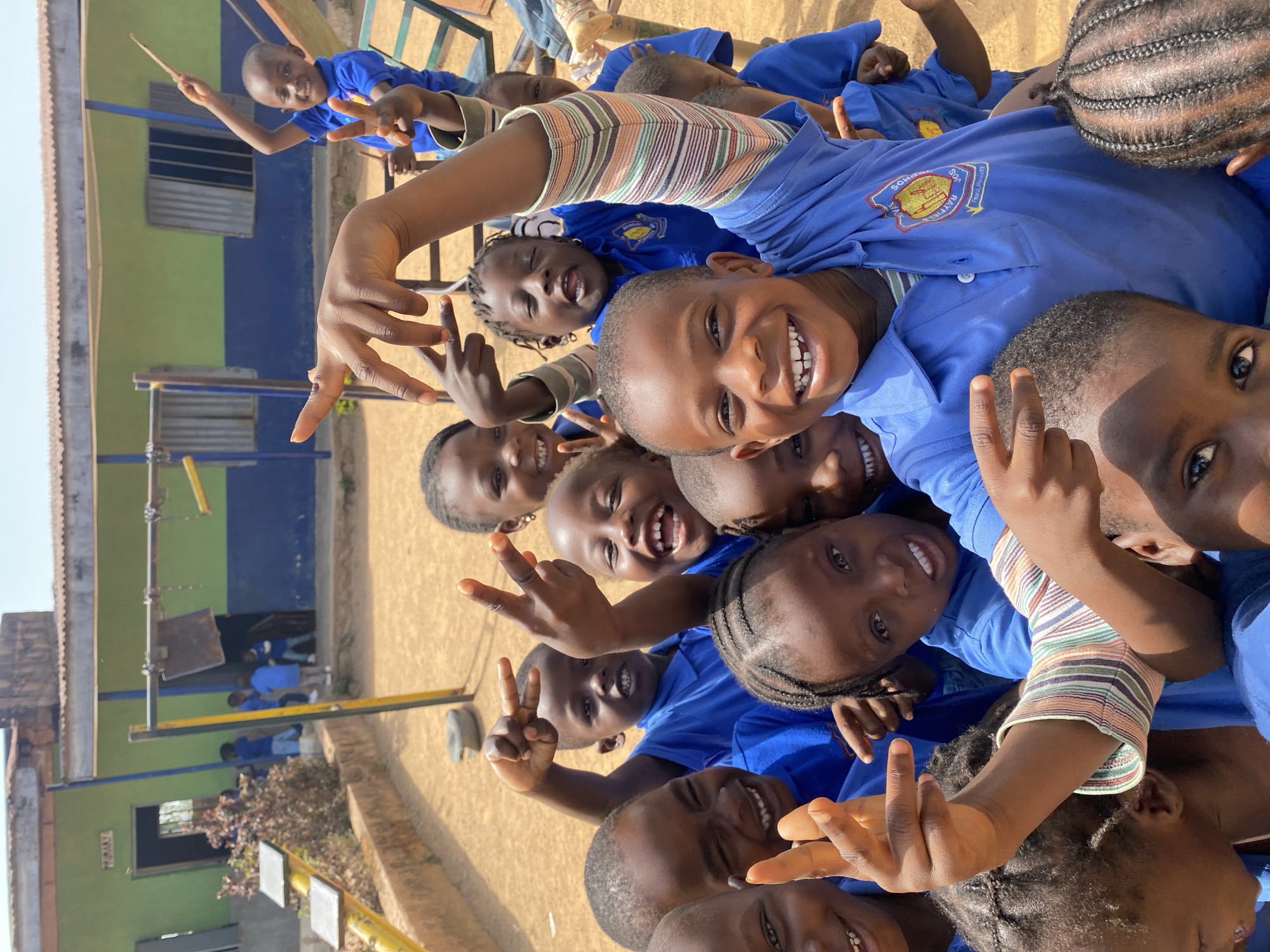 School children gather for photos in Gura Top, Nigeria