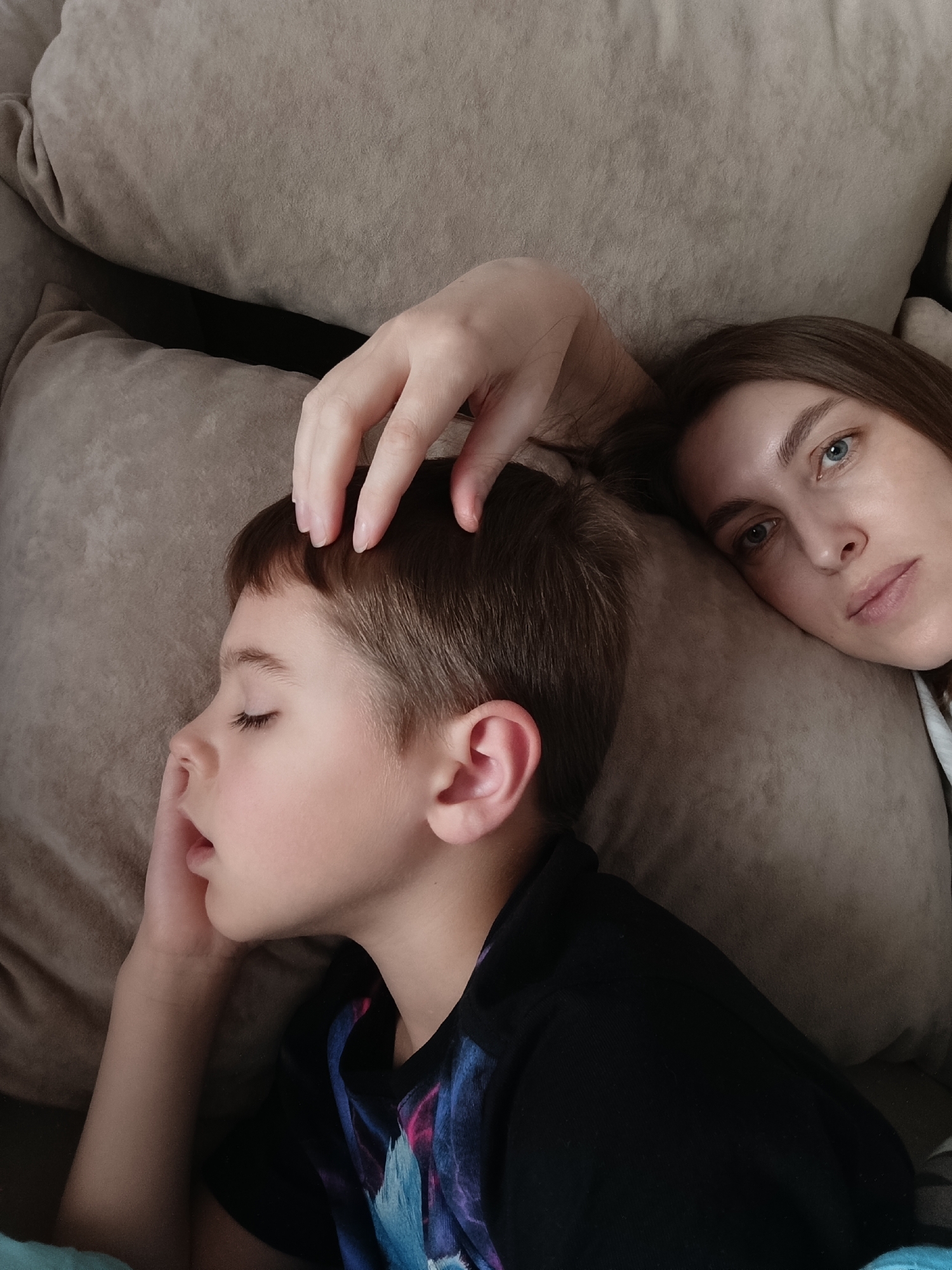 Mother captures quiet morning moments while child sleeps in Chaikovsky