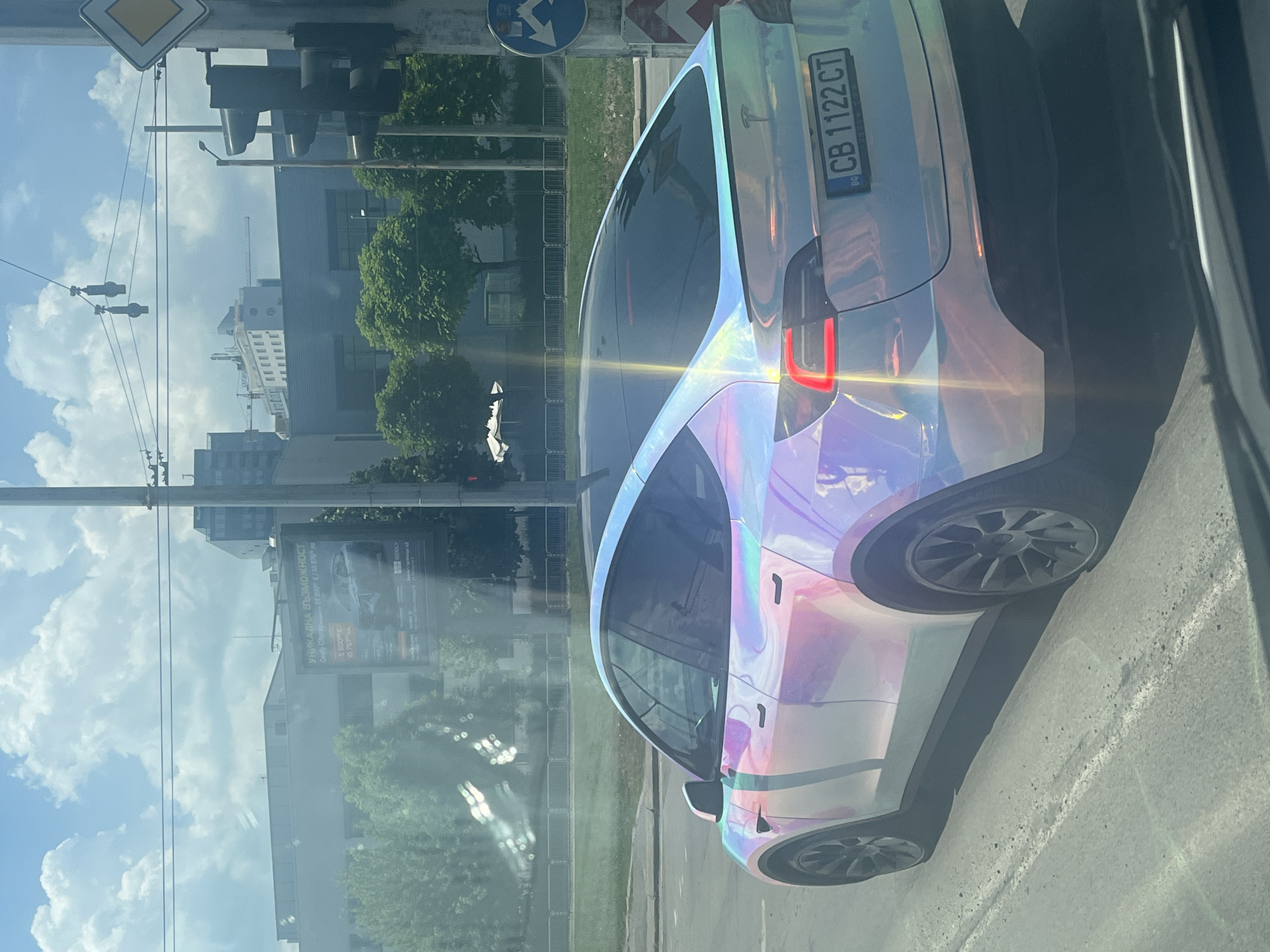 Tesla with holographic wrap spotted on city street