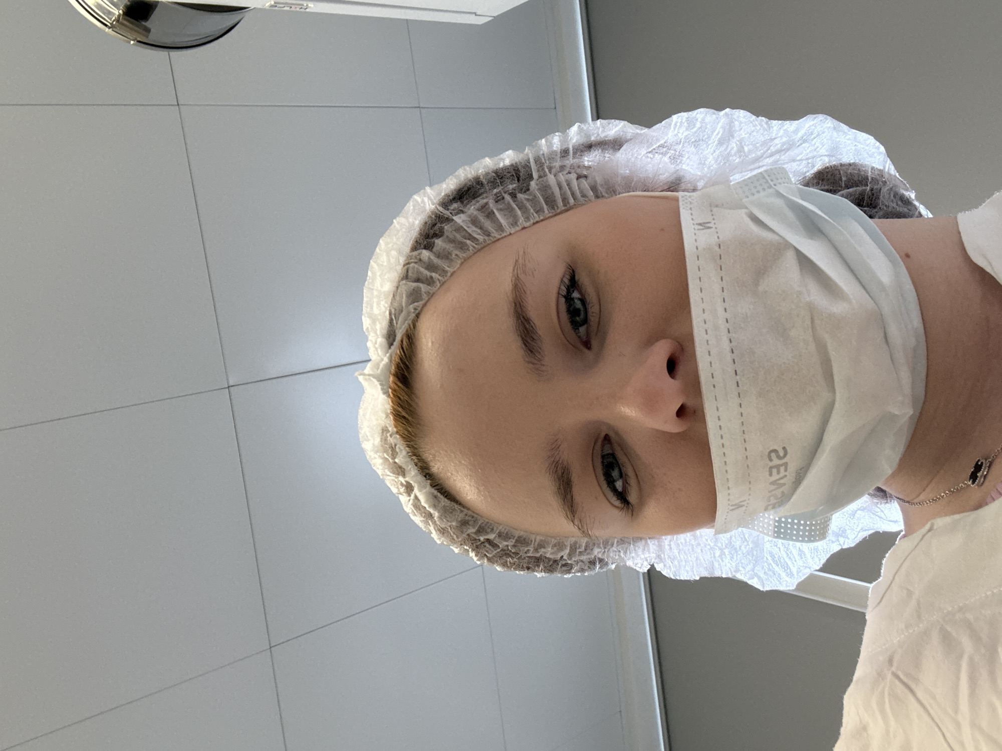 Medical professional documented during routine procedure in Saint Petersburg laboratory