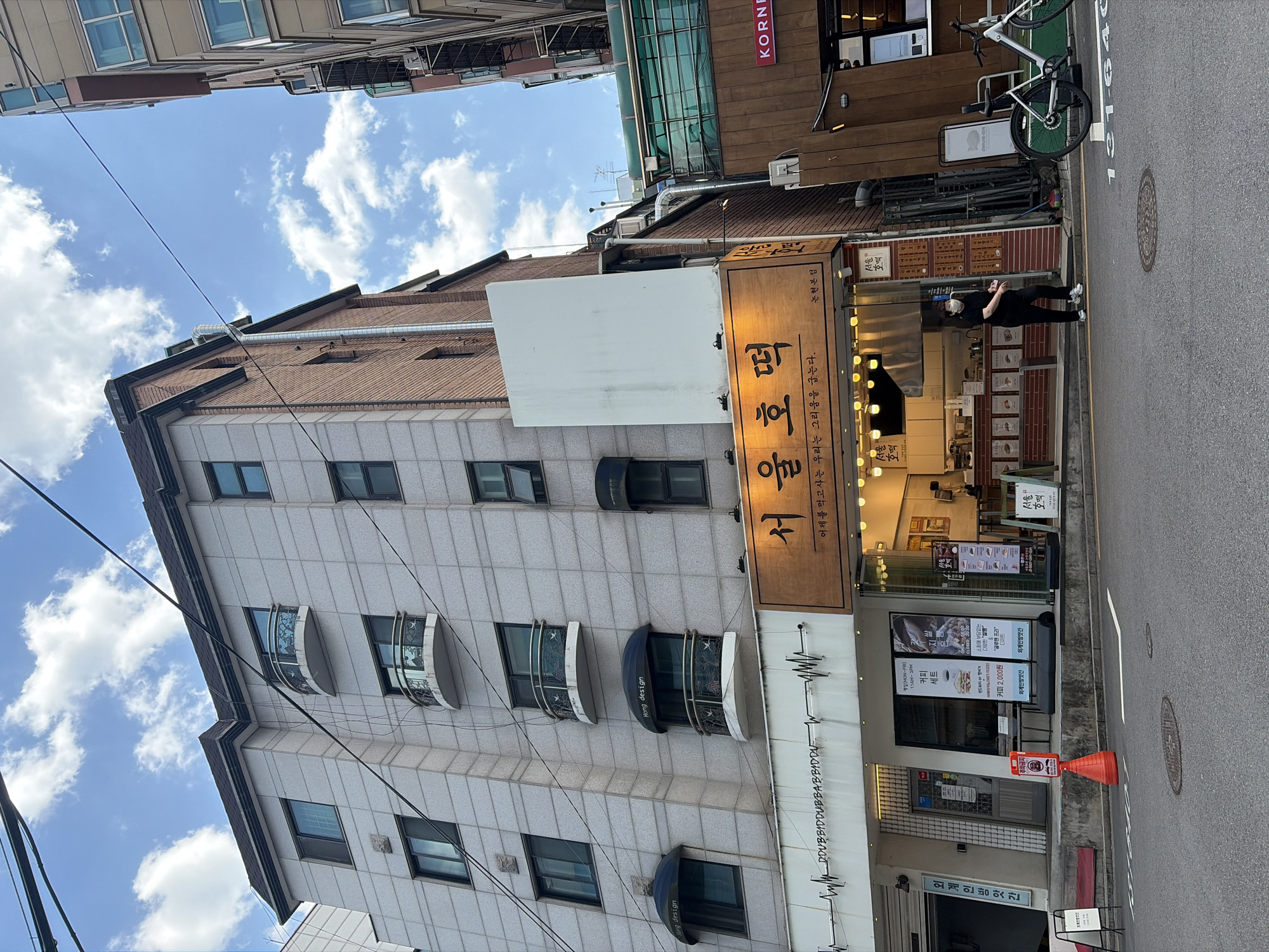 Early morning Seoul street scene captured with Korean signage