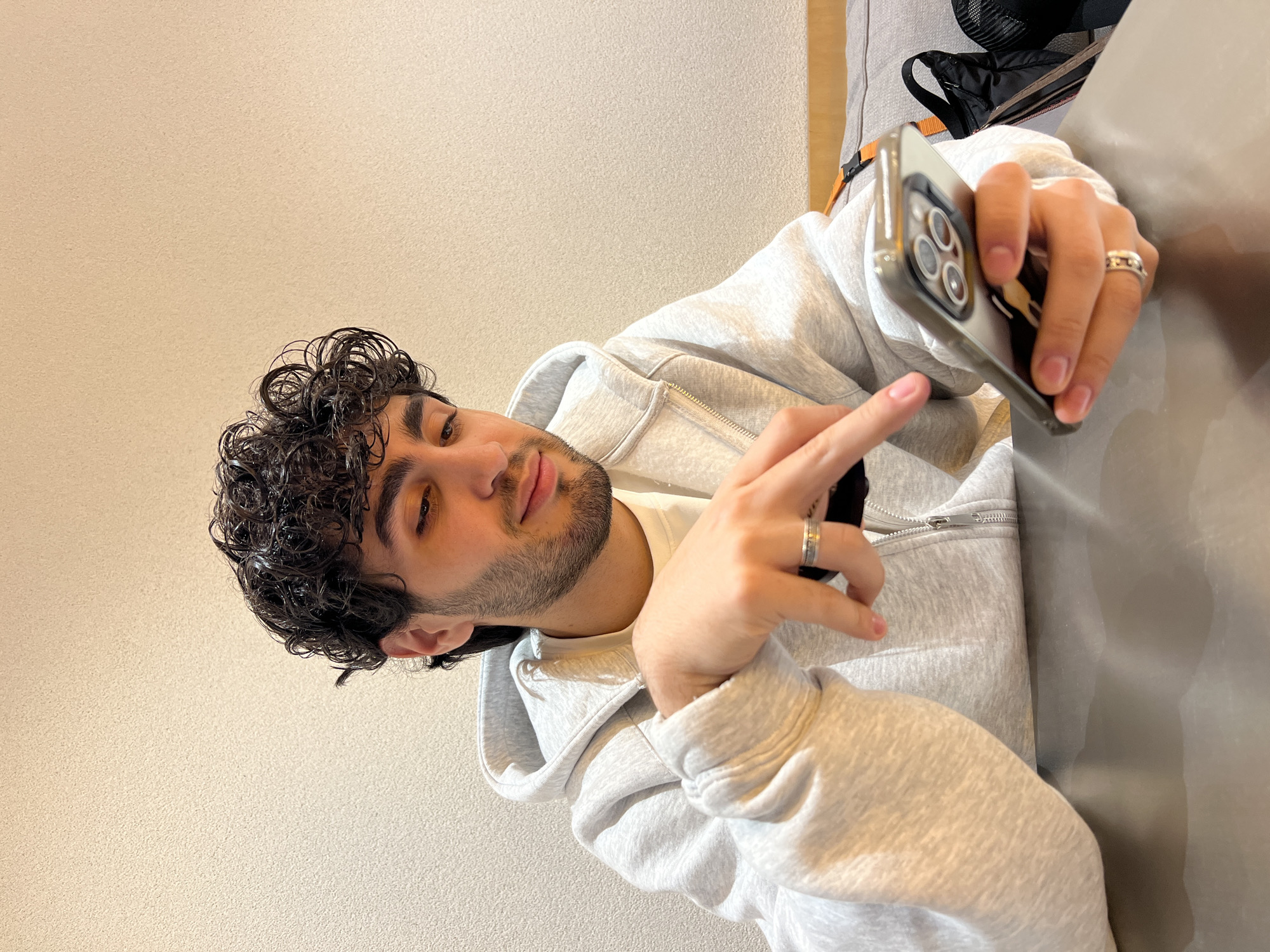 Young man documents restaurant visit through selfies in Yerevan