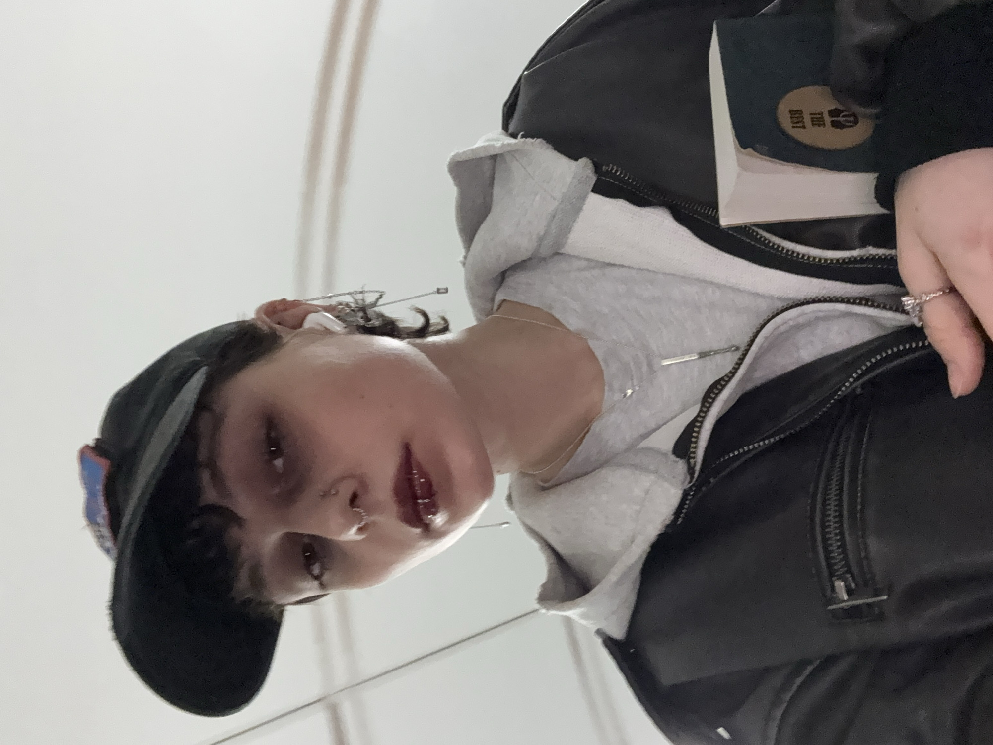 Person with piercings and dark makeup photographed in Moscow