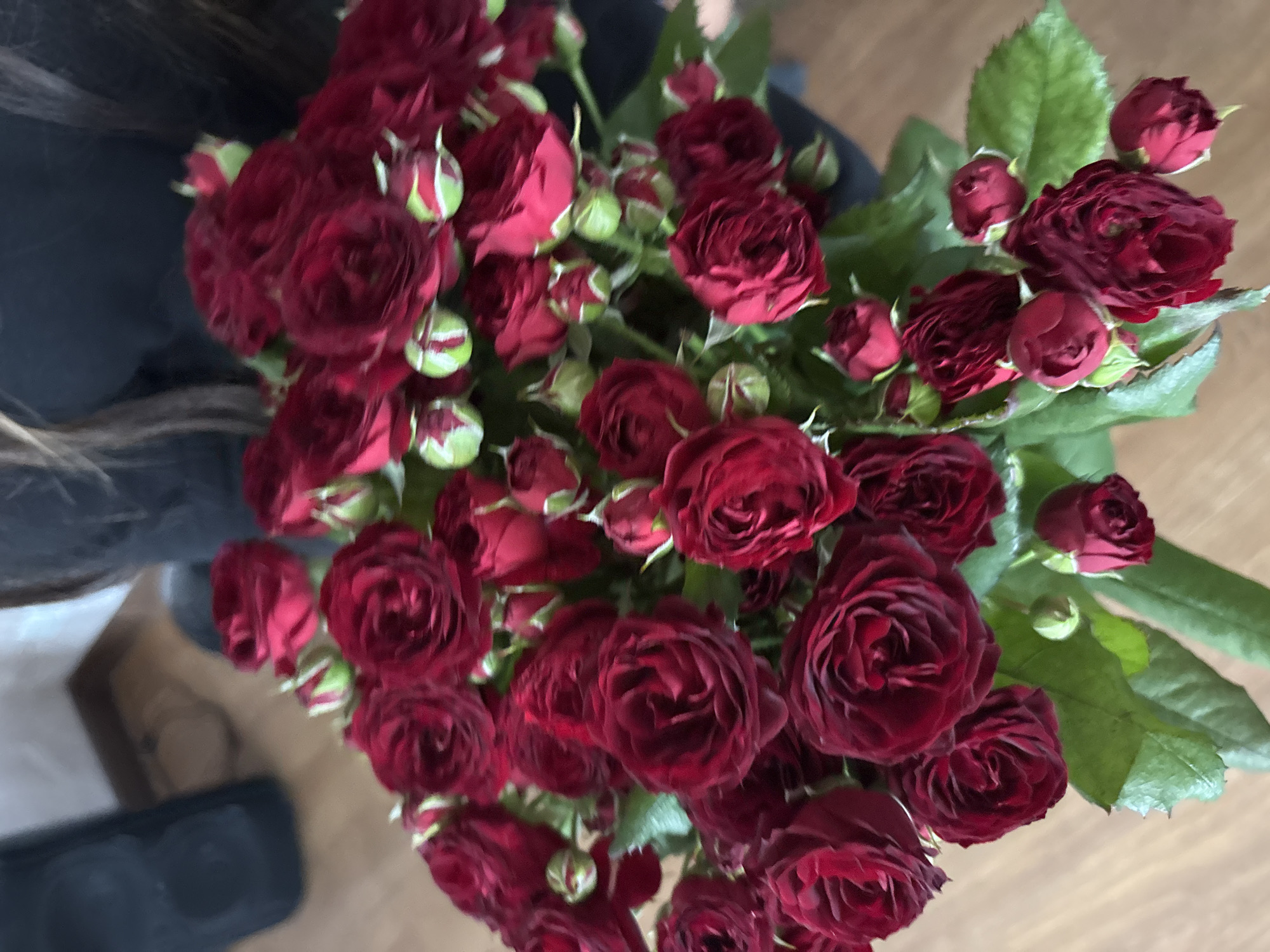 Flowers, schoolbooks, and Halloween decor in a home setting