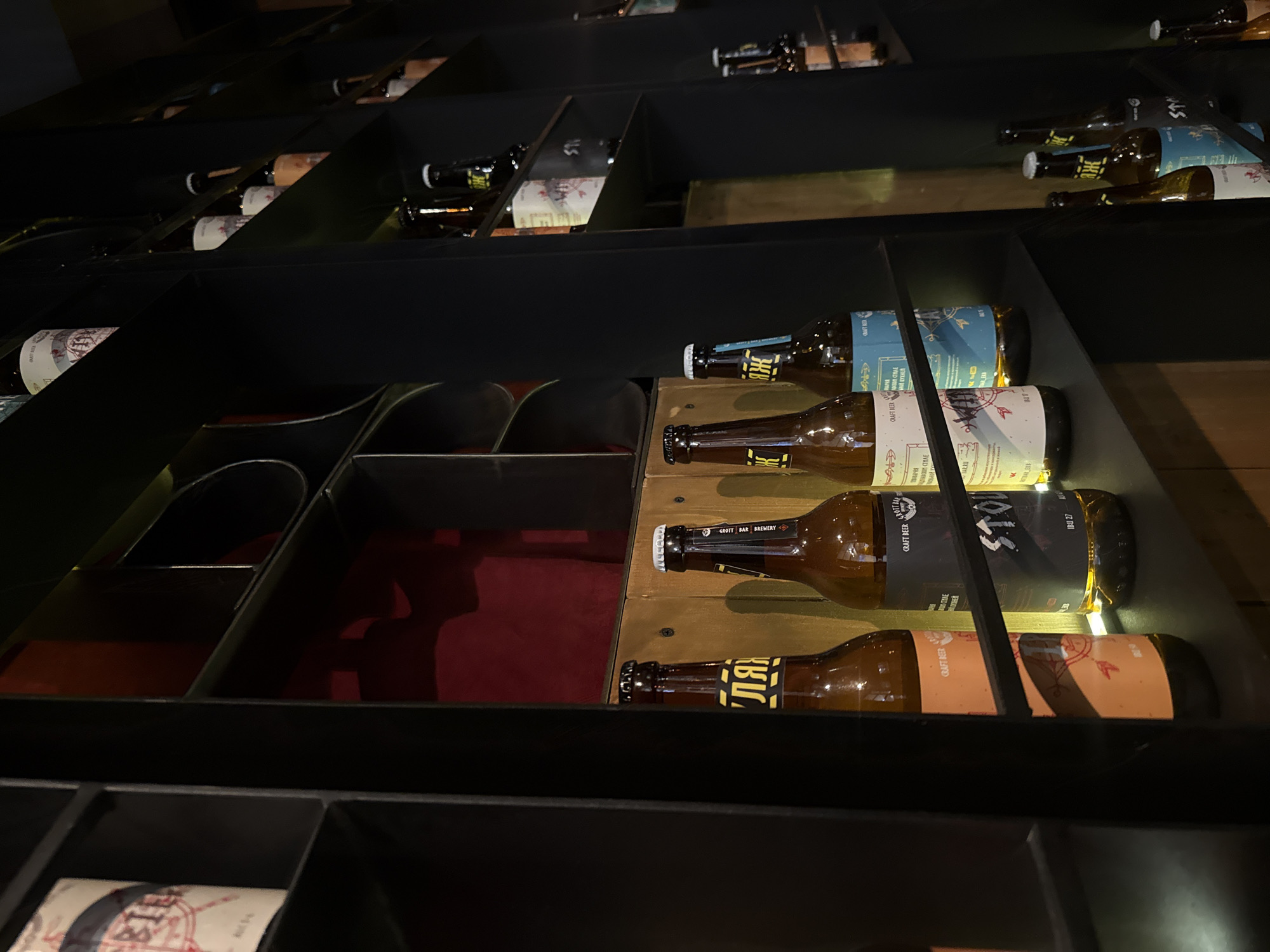 Craft beer display photographed in Yekaterinburg bar setting
