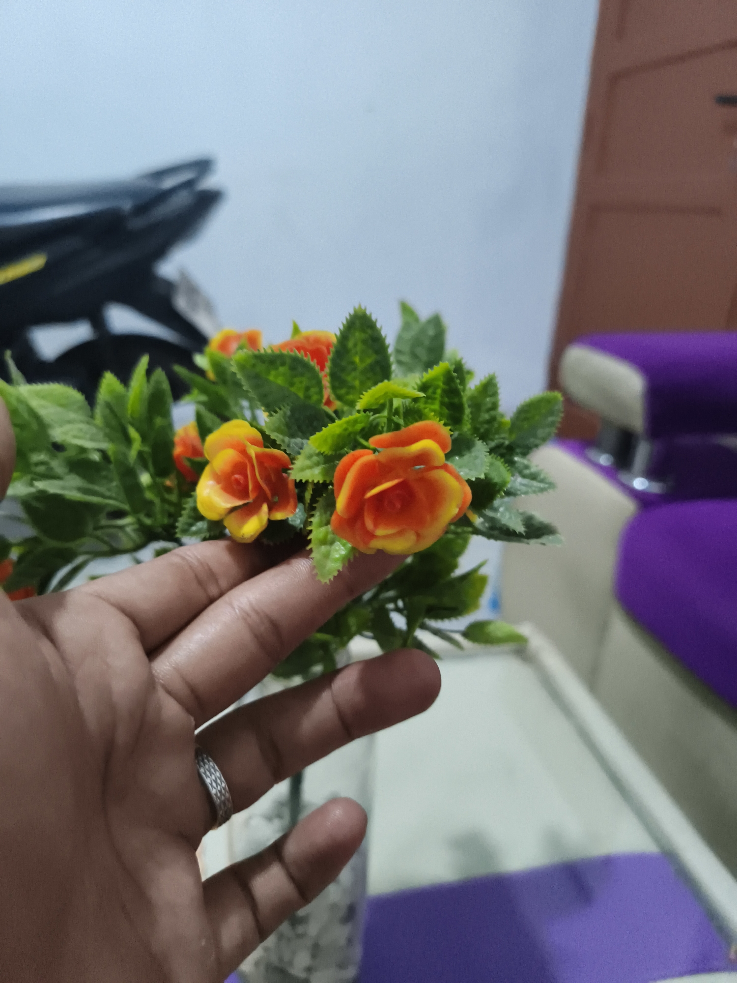 Artificial flower arrangements photographed indoors in Pangkalpinang