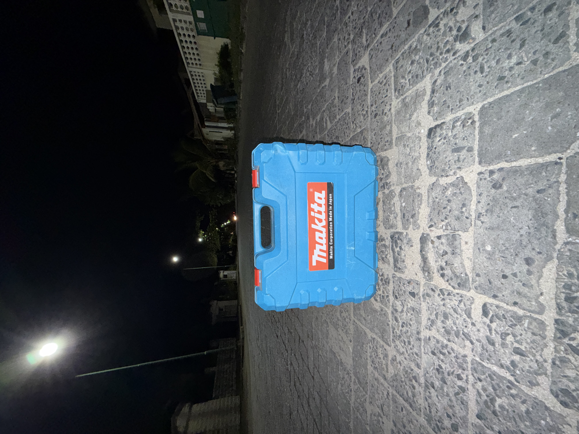 Blue Makita tool case spotted on pavement in Lagos