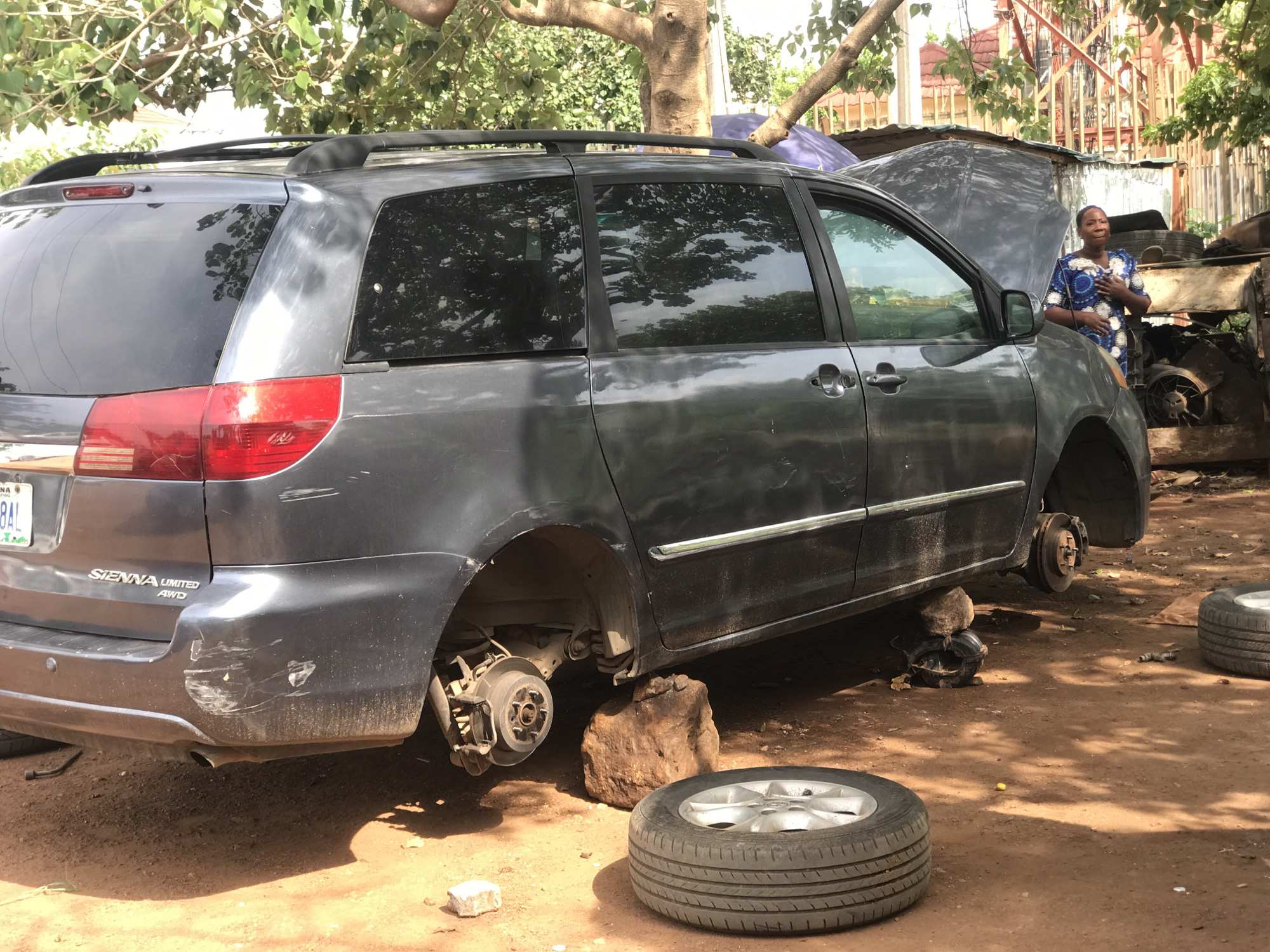 Daily life at Nigerian village auto workshops and markets