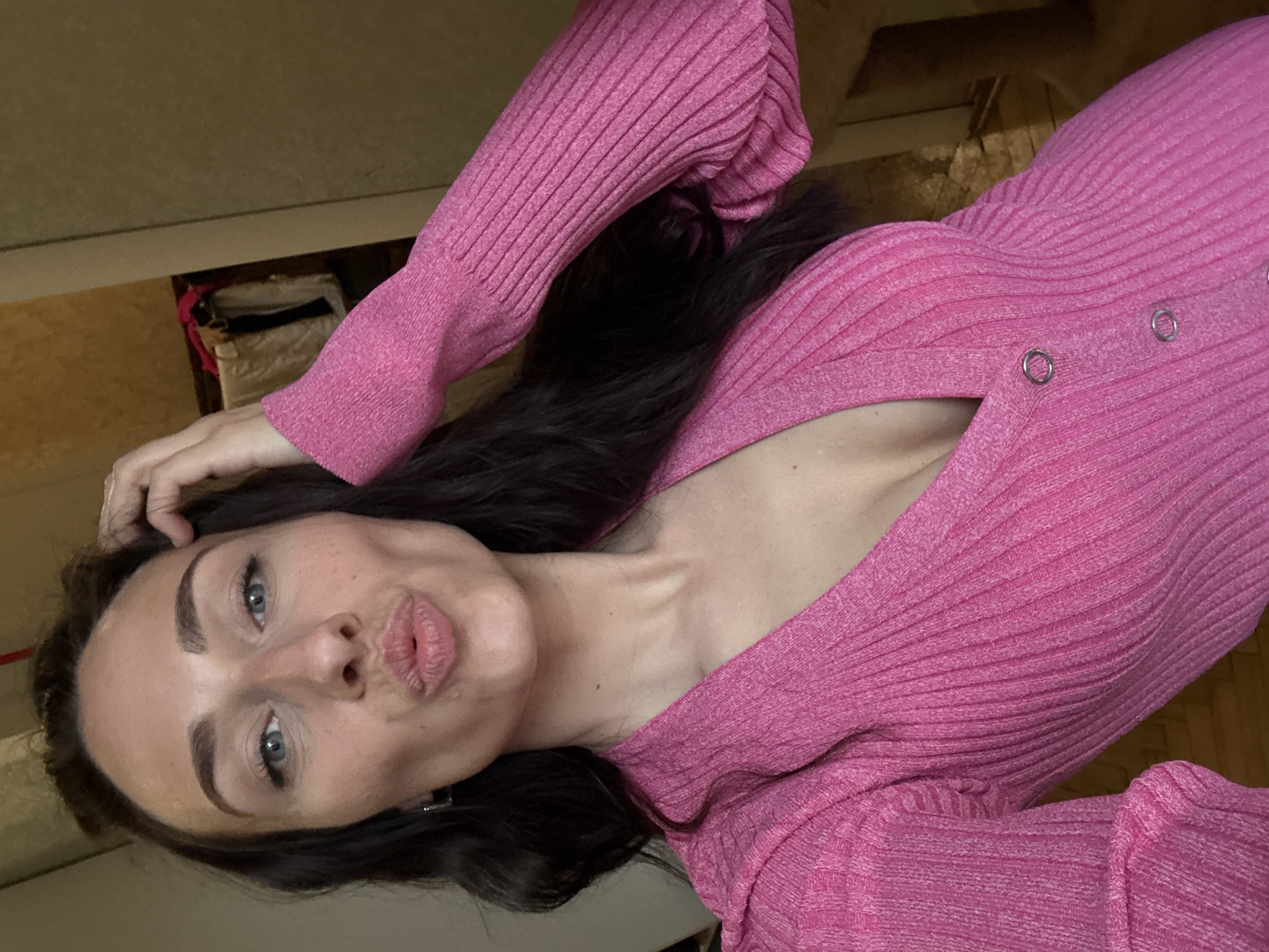 Woman takes multiple selfies indoors in Saint Petersburg