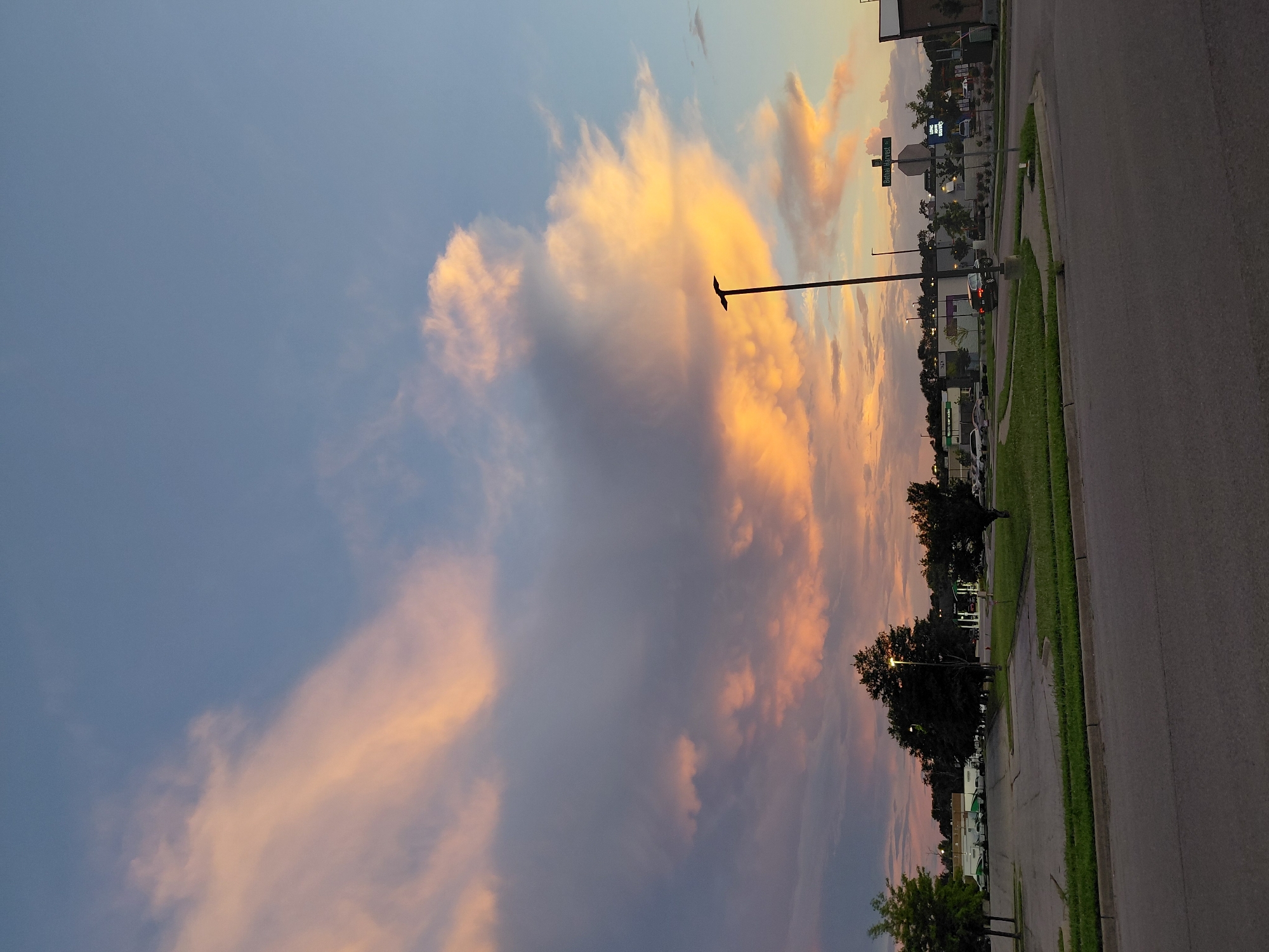 Dramatic sunset sky over Nicholasville neighborhoods and streets