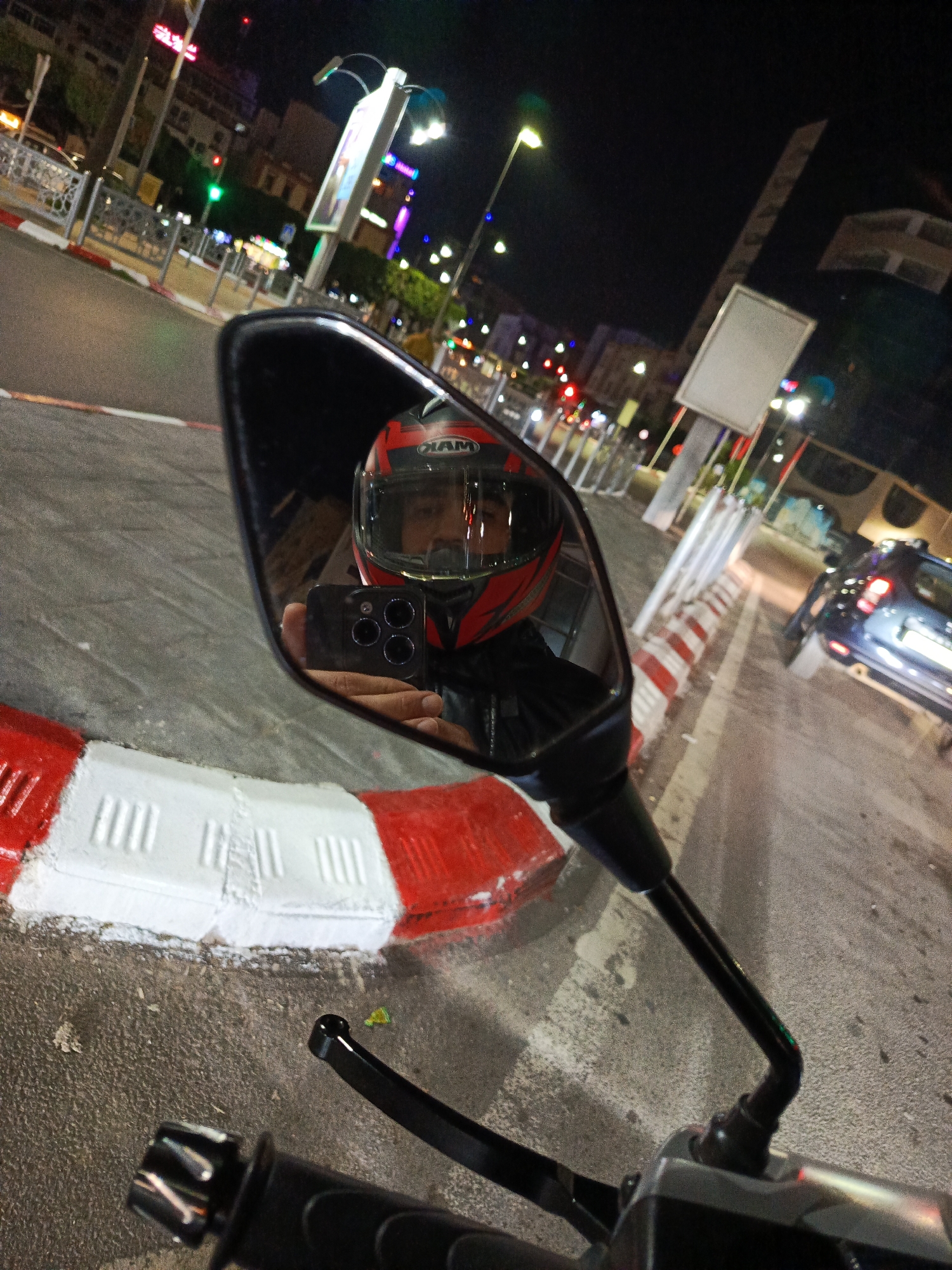 Nighttime motorcycle ride captured in Meknes, Morocco