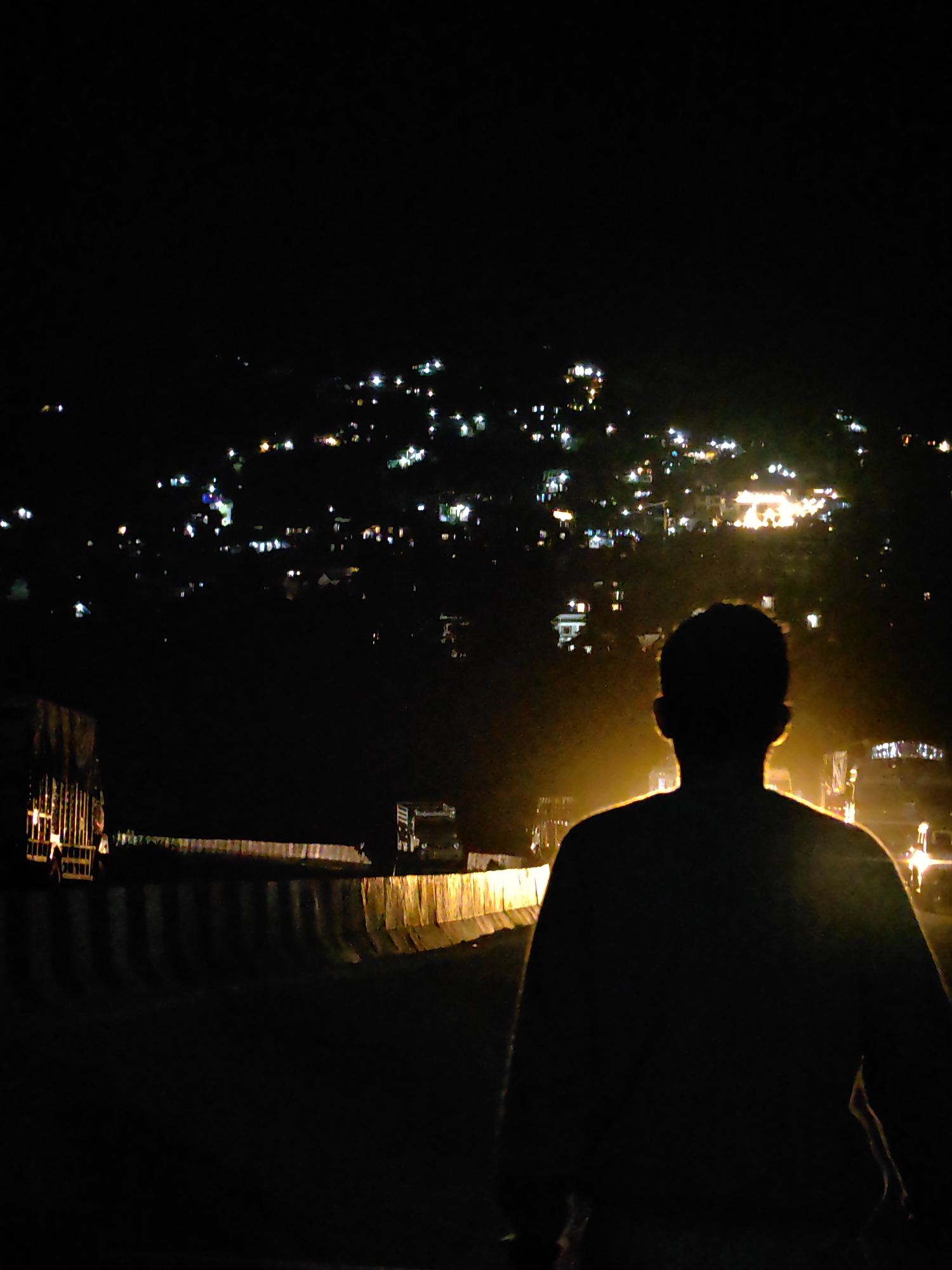 Night bus activity at a Manali departure point