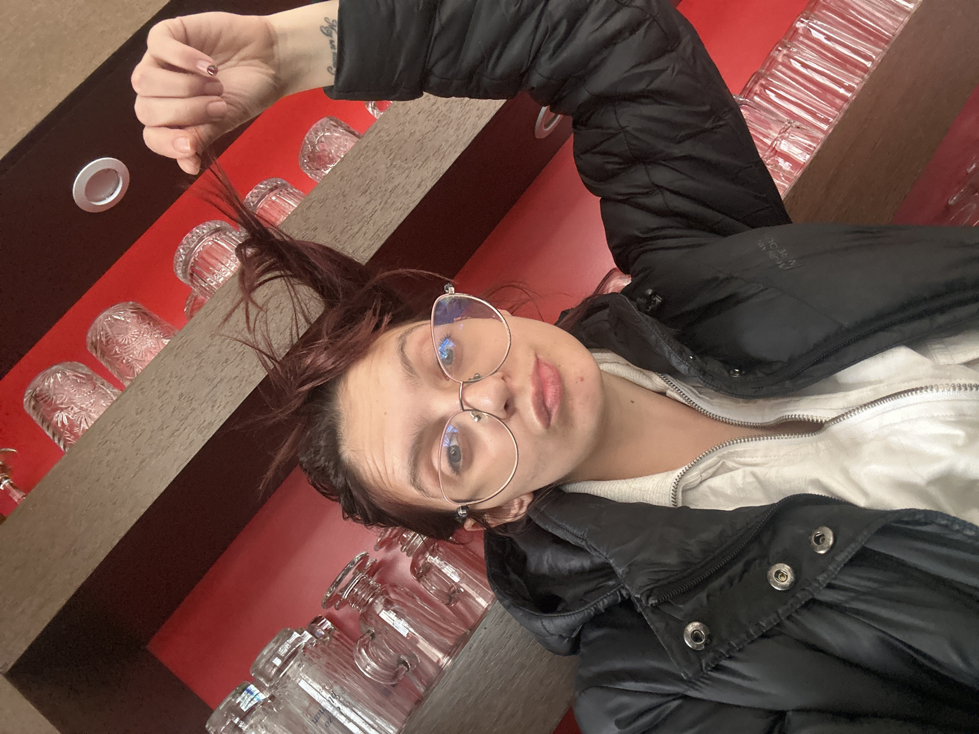 Woman takes selfies inside building in Tryavna, Bulgaria