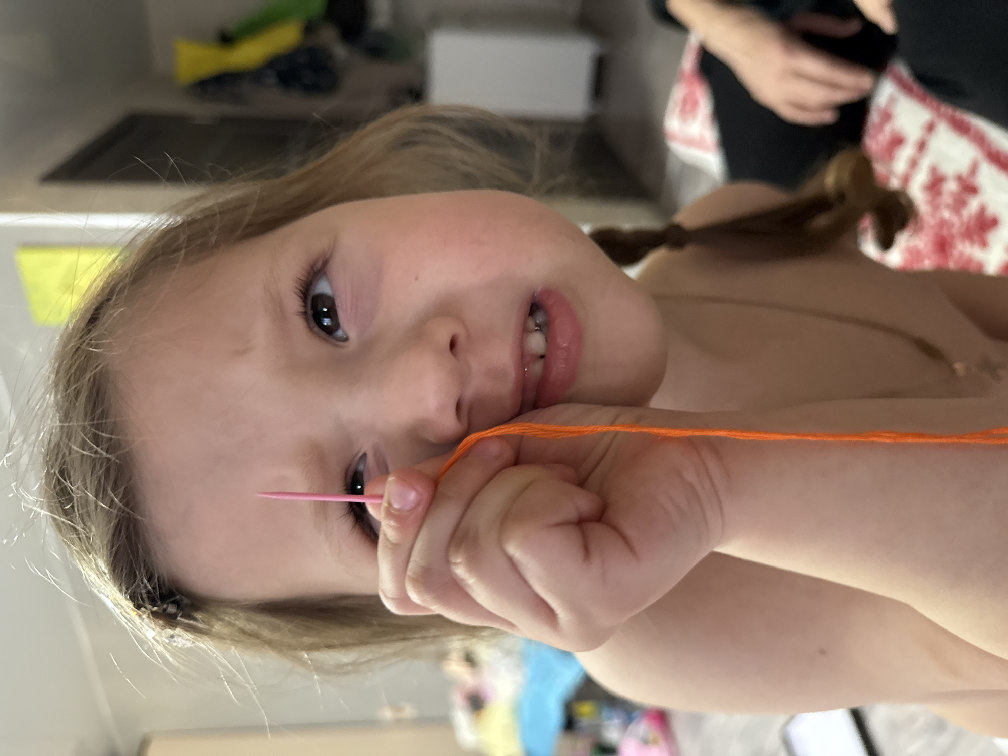 Children crafting with embroidery materials in Кипчак, Russia